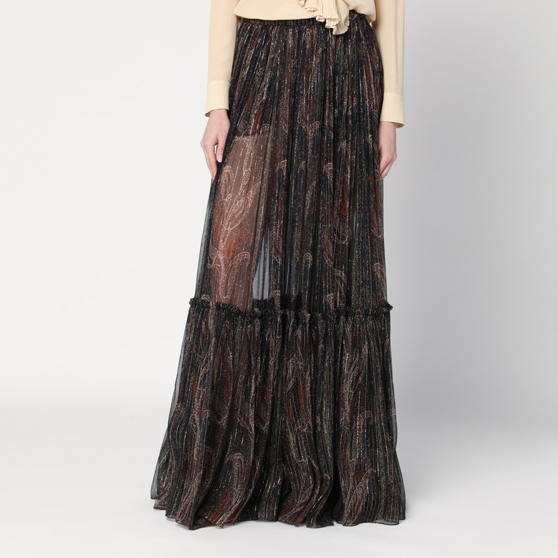 생 로랑의 실크 블렌드 페이즐리 프린트 플라운스 롱 스커트는 반투명 디자인, 루렉스 디테일, 낮은 허리, 지퍼 잠금 장치 및 두 개의 측면 포켓이 특징입니다. 이미지