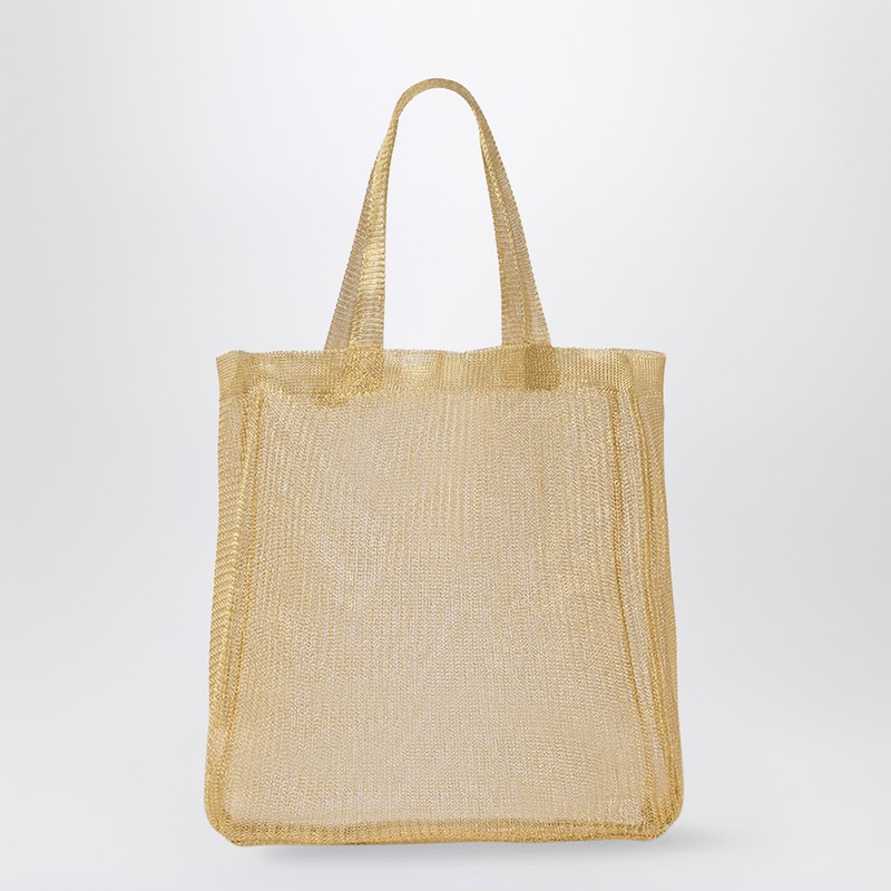 The Row의 금도금 황동 미니 토트백은 평평한 상단 핸들 2개, 반투명 디자인, 내부 수납 공간 1개가 특징입니다. 이미지