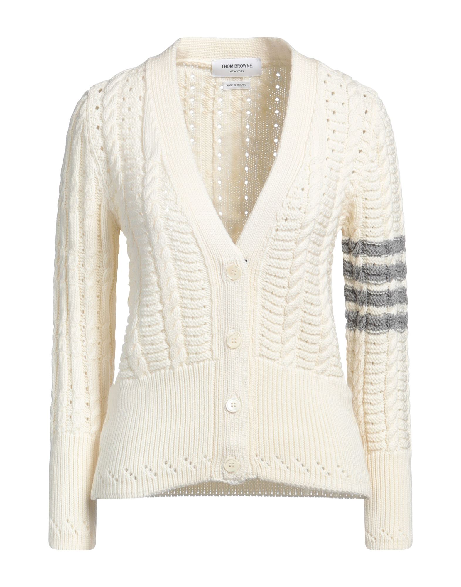 니트 소재, 케이블 니트, 미디엄웨이트 니트, 장식 부착 없음, 투톤 패턴, 롱 슬리브, 버튼 여밈, 포켓 없음, 드라이클리닝, 표백 금지, 건조기 사용불가. 이미지