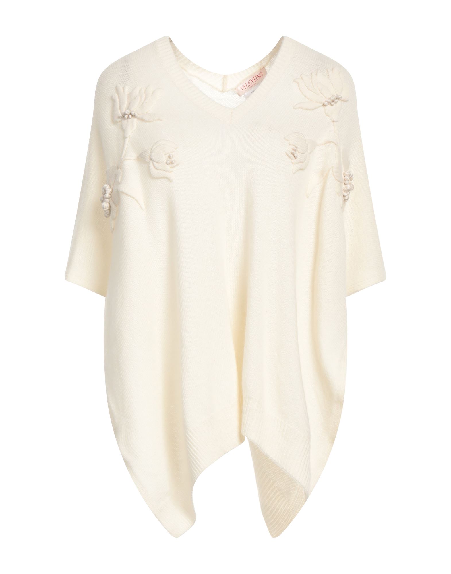 니트 소재, 라이트웨이트 니트, 콘트라스트 디테일, 장식 디테일 솔리드 컬러, v 네크라인, 슬리브리스, 안감없음, 포켓 없음, 판초 스타일. 이미지