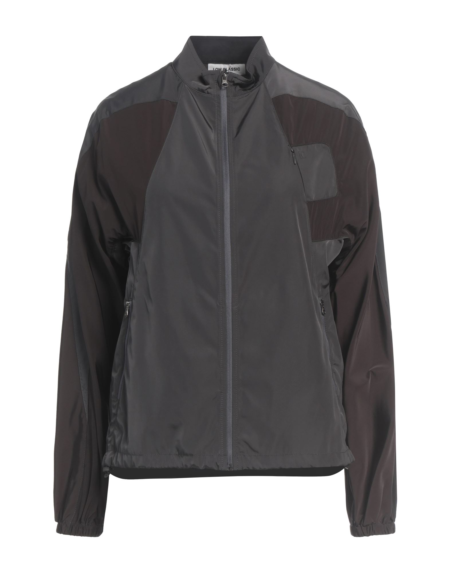 윈드브레이커, 테크니컬 패브릭, 투톤 패턴, 장식 부착 없음, 터틀넥, 롱 슬리브, 안감없음, 지퍼 여밈, 멀티 포켓, 지퍼 포켓, 세탁기로 세탁, 표백 금지, 건조기 사용불가, 다림질 금지. 이미지