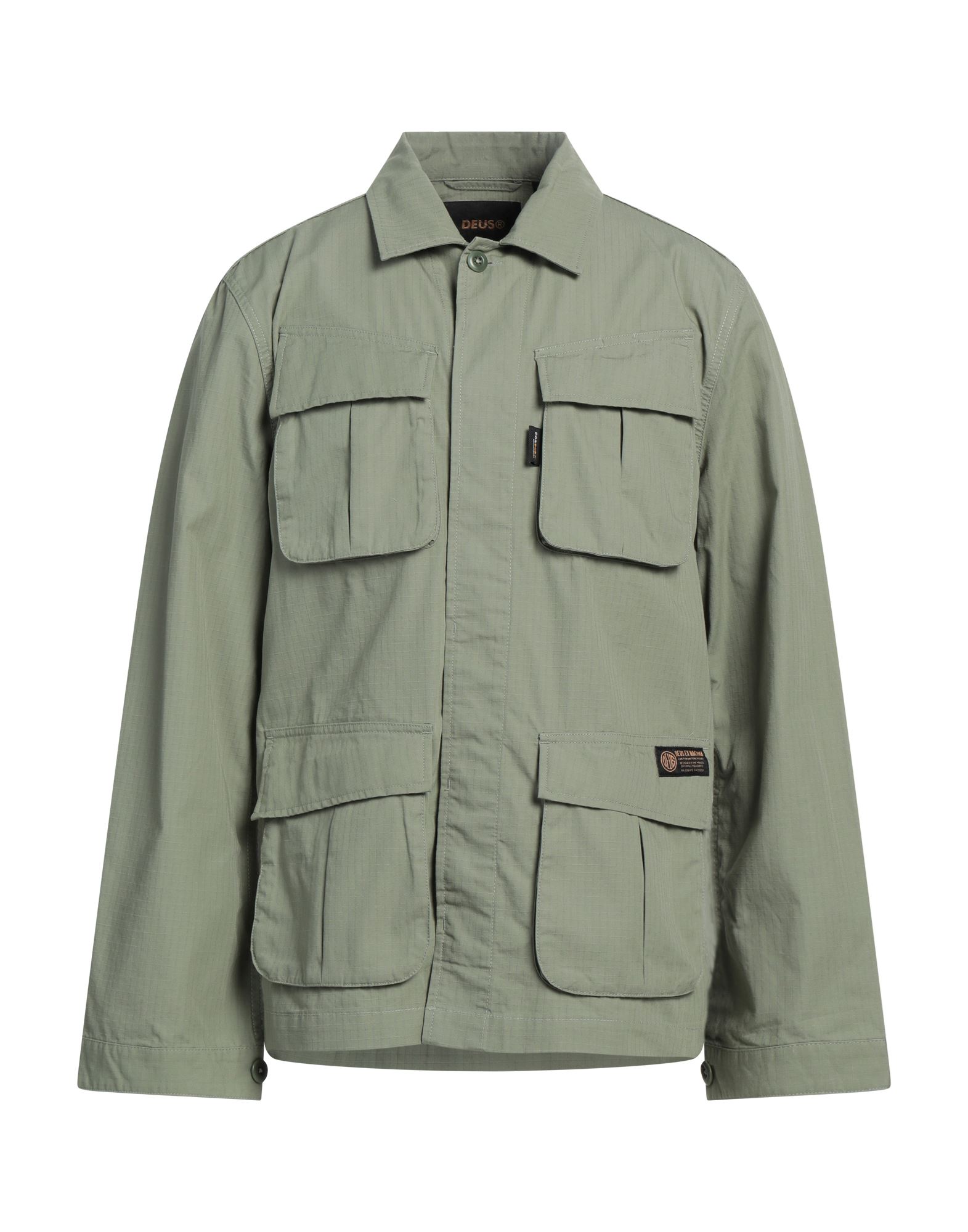 사파리 자켓, 우븐, 솔리드 컬러, 브랜드 로고, 캠프 칼라, 싱글브레스티드, 롱 슬리브, 안감없음, 버튼 여밈, 멀티 포켓, 세탁기로 세탁, 표백 금지, 건조기 사용불가. 이미지