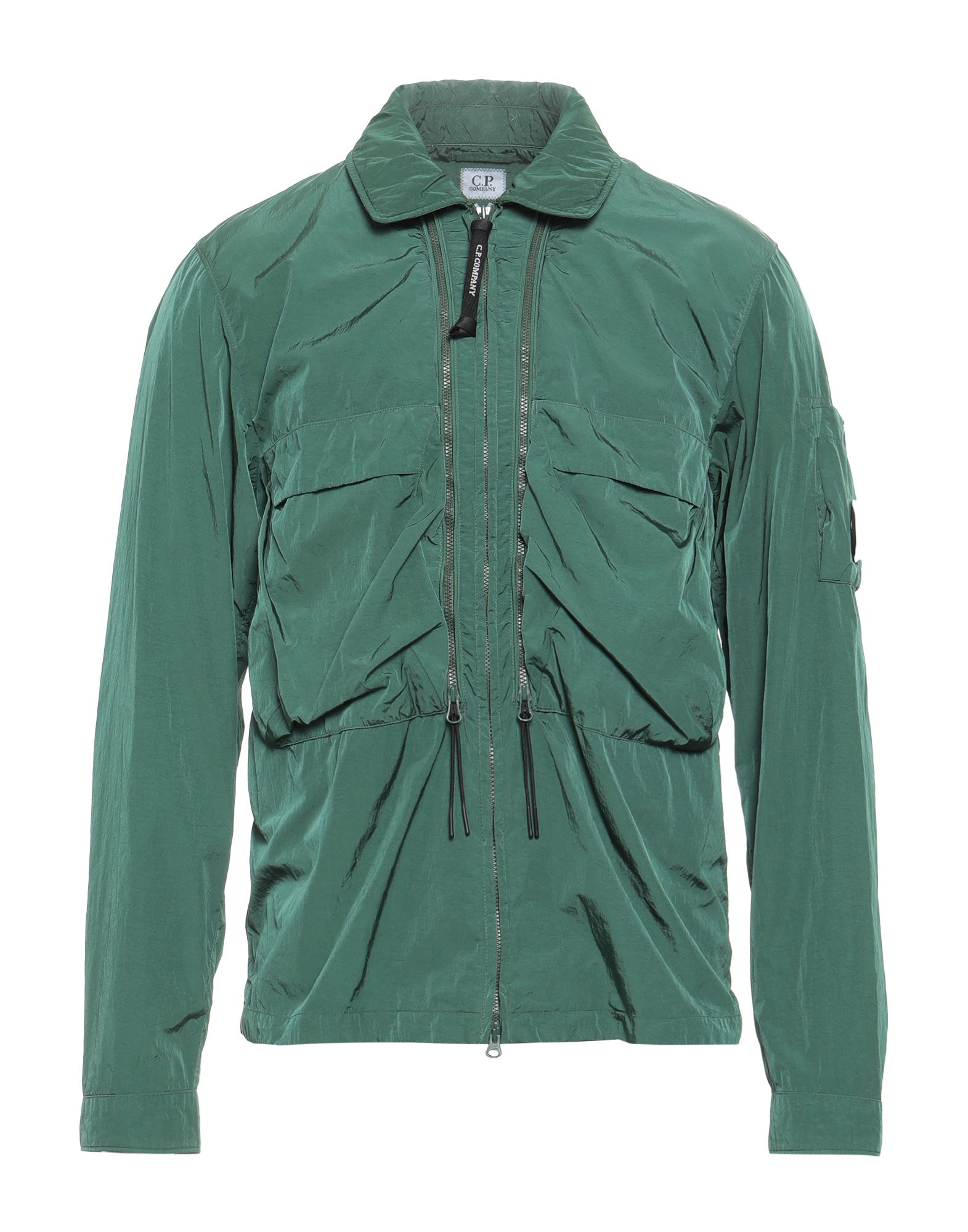 윈드브레이커, 테크니컬 패브릭, 솔리드 컬러, 브랜드 로고, 클래식 칼라, 롱 슬리브, 안감없음, 지퍼 여밈, 멀티 포켓, 세탁기로 세탁, 표백 금지, 건조기 사용불가. 이미지