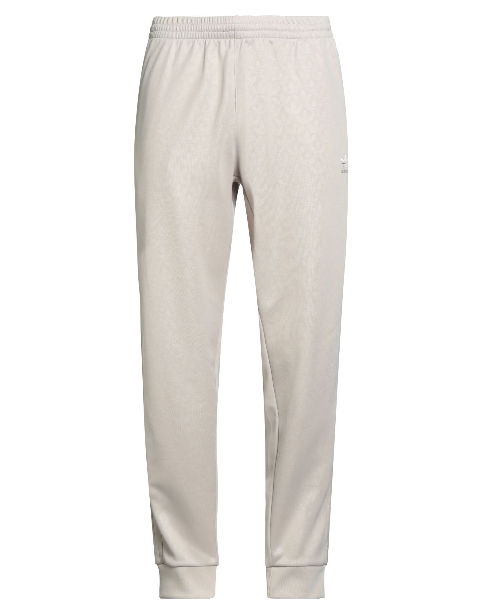 트랙 팬츠, 저지, 로고 디자인, 브랜드 로고, 사이드 스트라이프, 로우 크로치, 드로스트링 웨이스트, 레귤러 핏, 지퍼 포켓, 세탁기로 세탁, 표백 금지, 건조기 사용불가, 운동이나 야외 활동에 적합한, 스타일과 편안함을 모두 갖춘 퍼포먼스 스포츠웨어. 이미지