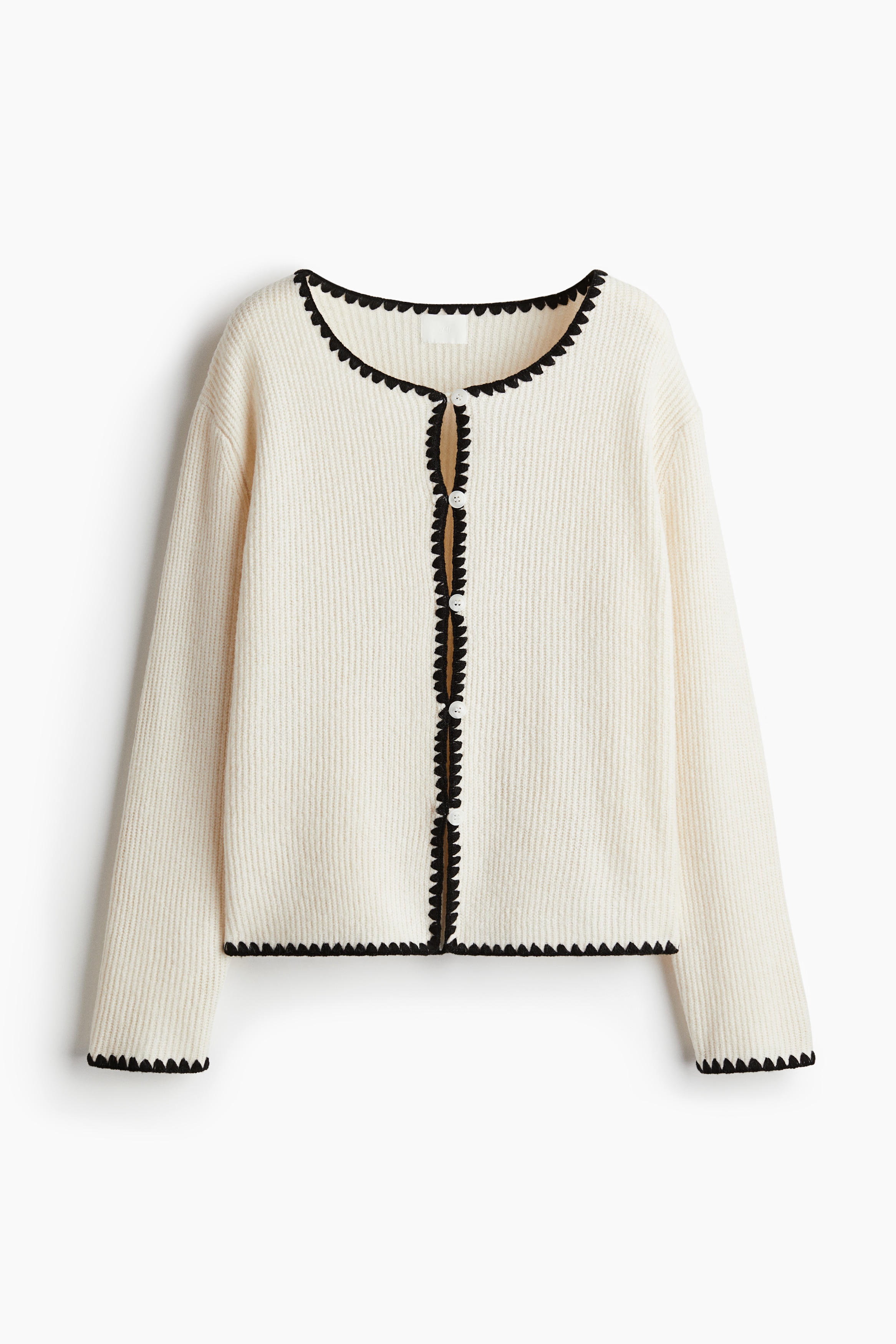 부드러운 리브니트 소재의 가디건. 포인트 컬러의 블랭킷 스트치 장식. 라운드넥. 버튼업 스타일. 드롭 숄더. 긴소매. 이미지