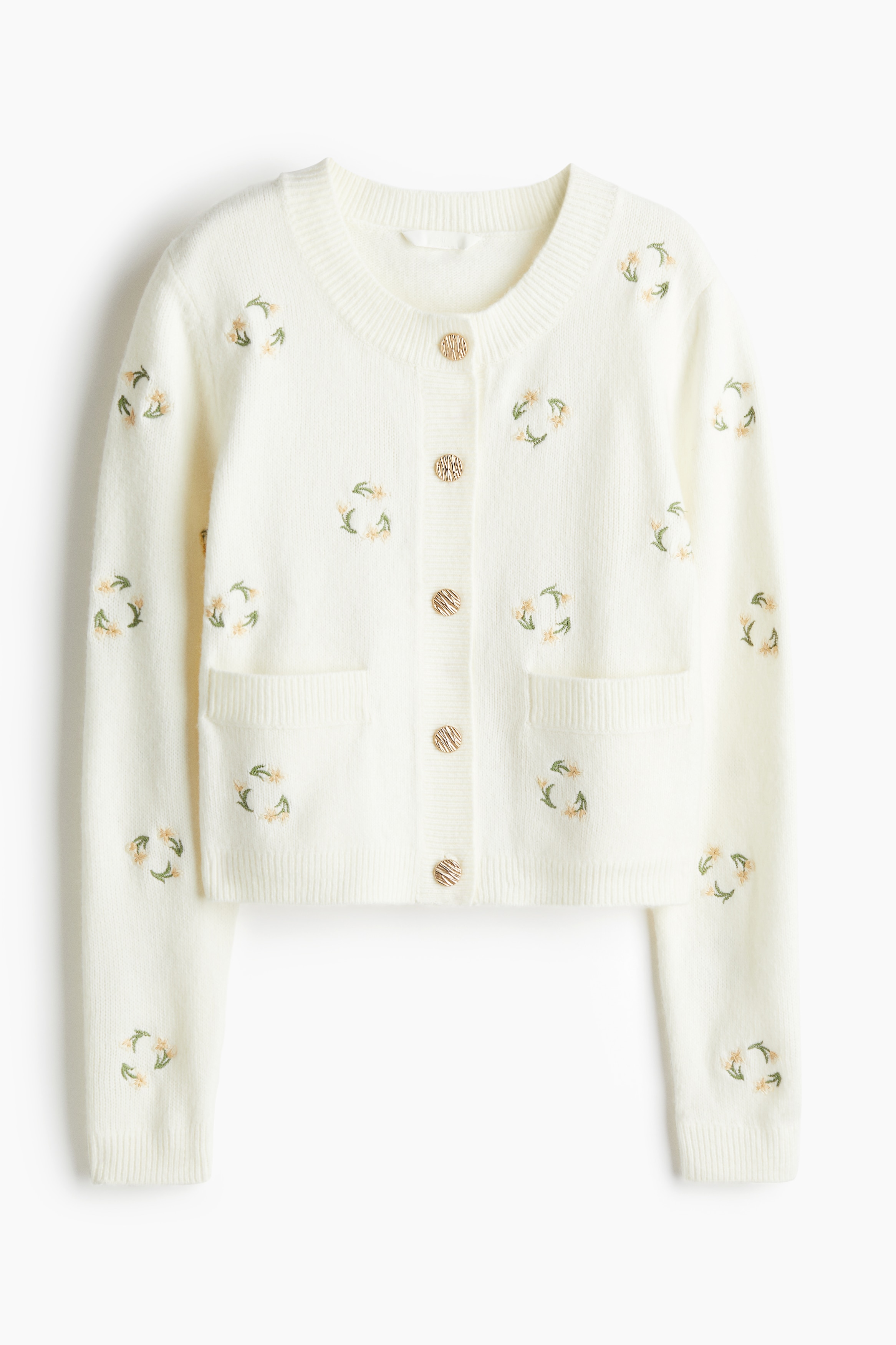 자수 패턴이 있는 부드러운 니트 소재의 가디건. 라운드넥. 버튼업 스타일. 앞면 웰트포켓. 옷단과 포켓 입구 부분이 리브드 마감됨. 이미지