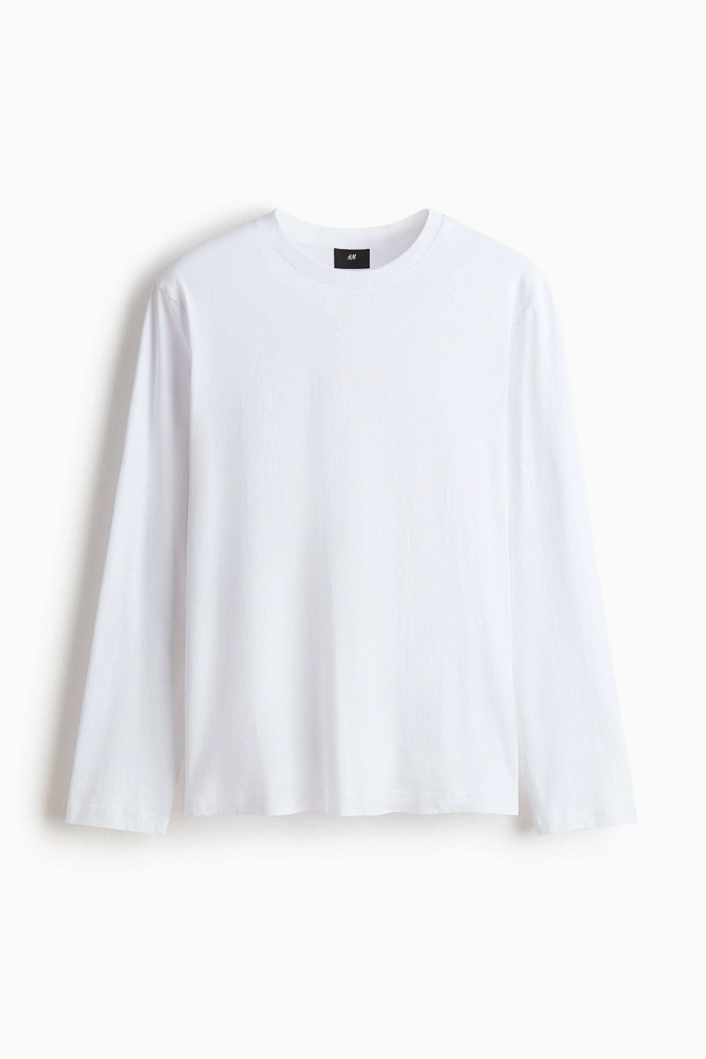 가벼운 코튼 저지 소재의 긴소매 탑. 리브드 마감된 라운드넥. 스트레이트 헴라인. 착용감이 편안하고 클래식한 레귤러핏 실루엣. 이미지