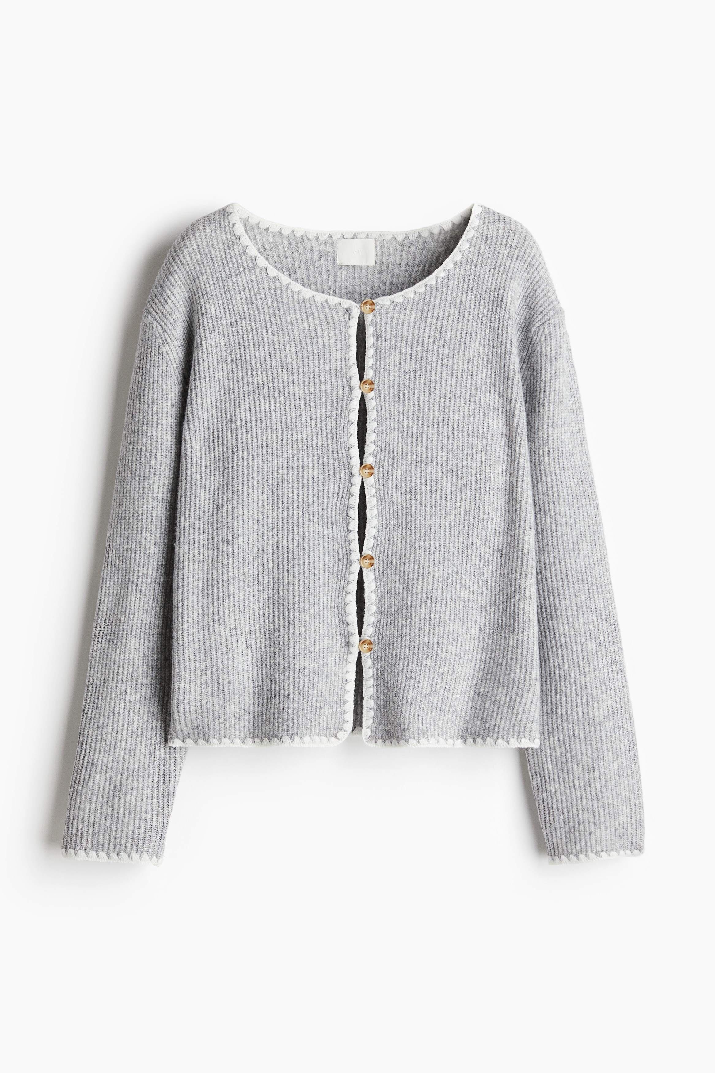 부드러운 리브니트 소재의 가디건. 포인트 컬러의 블랭킷 스트치 장식. 라운드넥. 버튼업 스타일. 드롭 숄더. 긴소매. 이미지