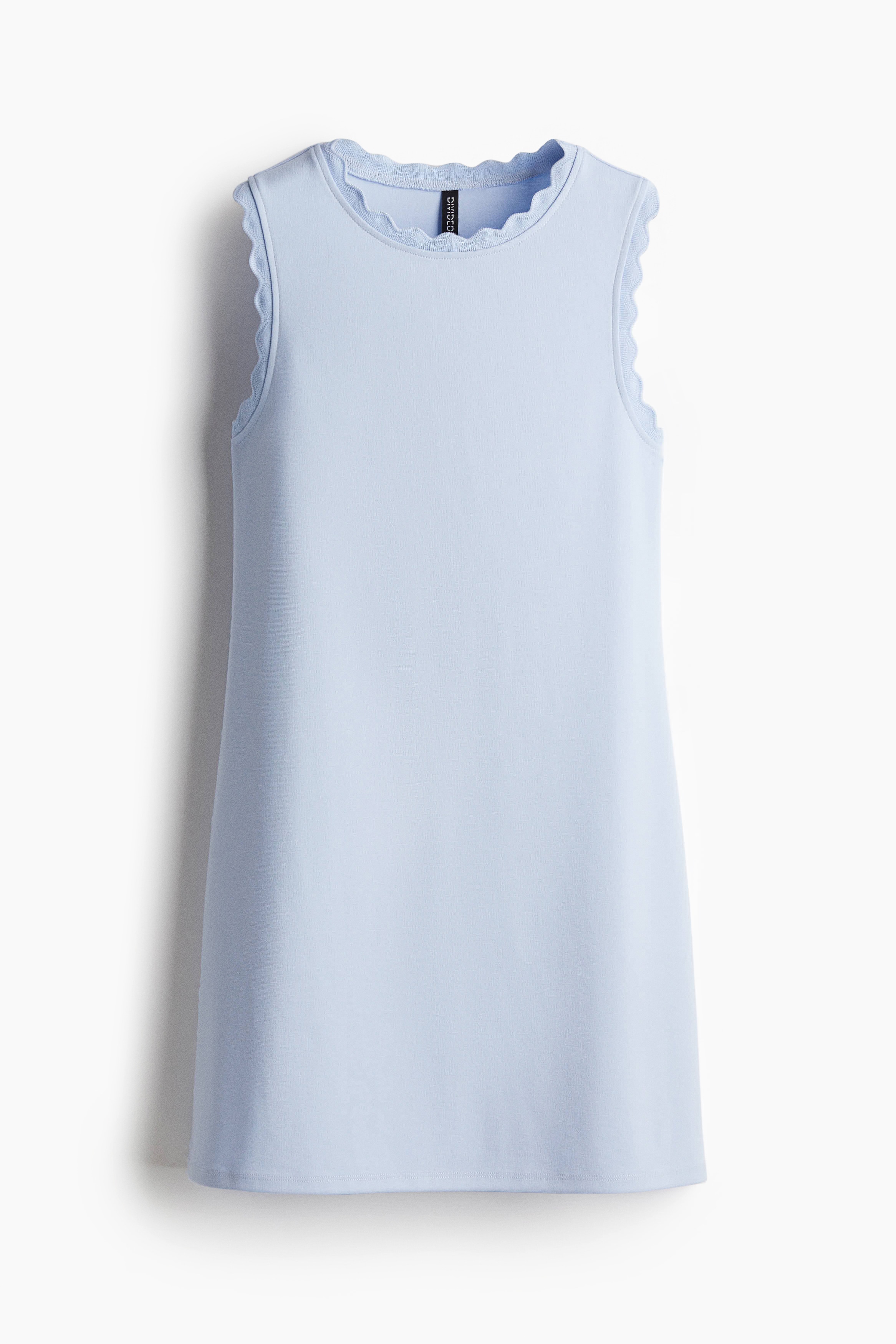 톡톡한 저지 소재의 슬리브리스 미니 드레스. 라운드넥. 스캘럽트 라인으로 트리밍된 네크라인과 암홀 옷단. 이미지