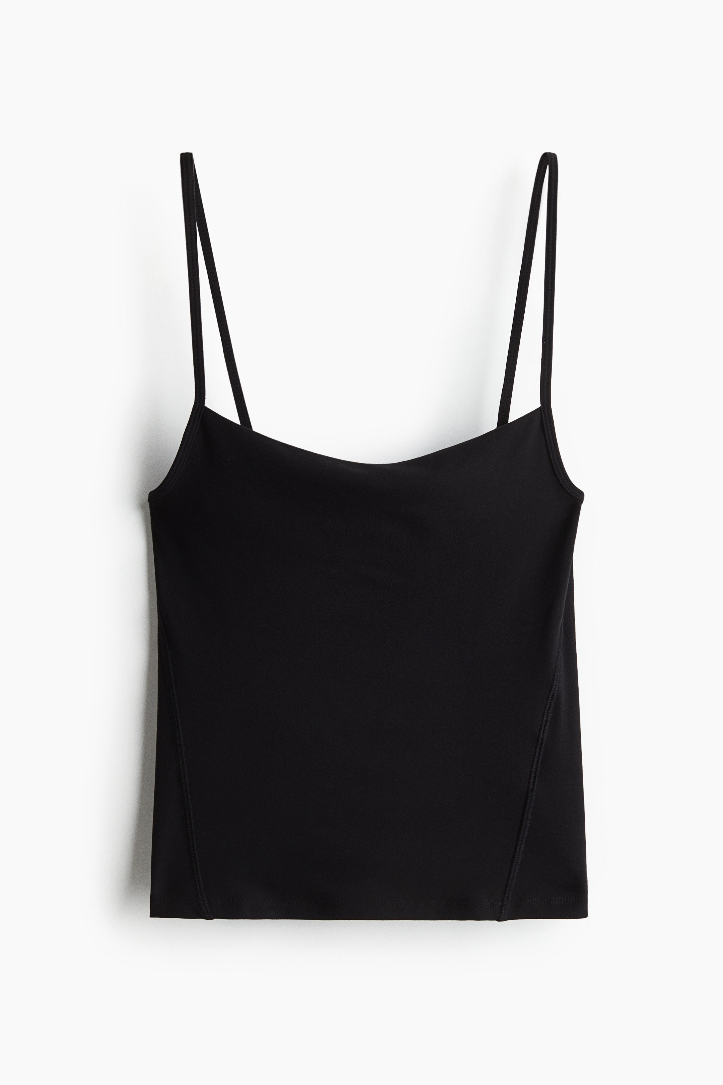 스트레치 저지 소재의 피트되는 탑. 스트레이트 네크라인. 길이 조절 가능한 가는 어깨 스트랩. 약간 앞면으로 배치된 옆면 솔기. 이미지