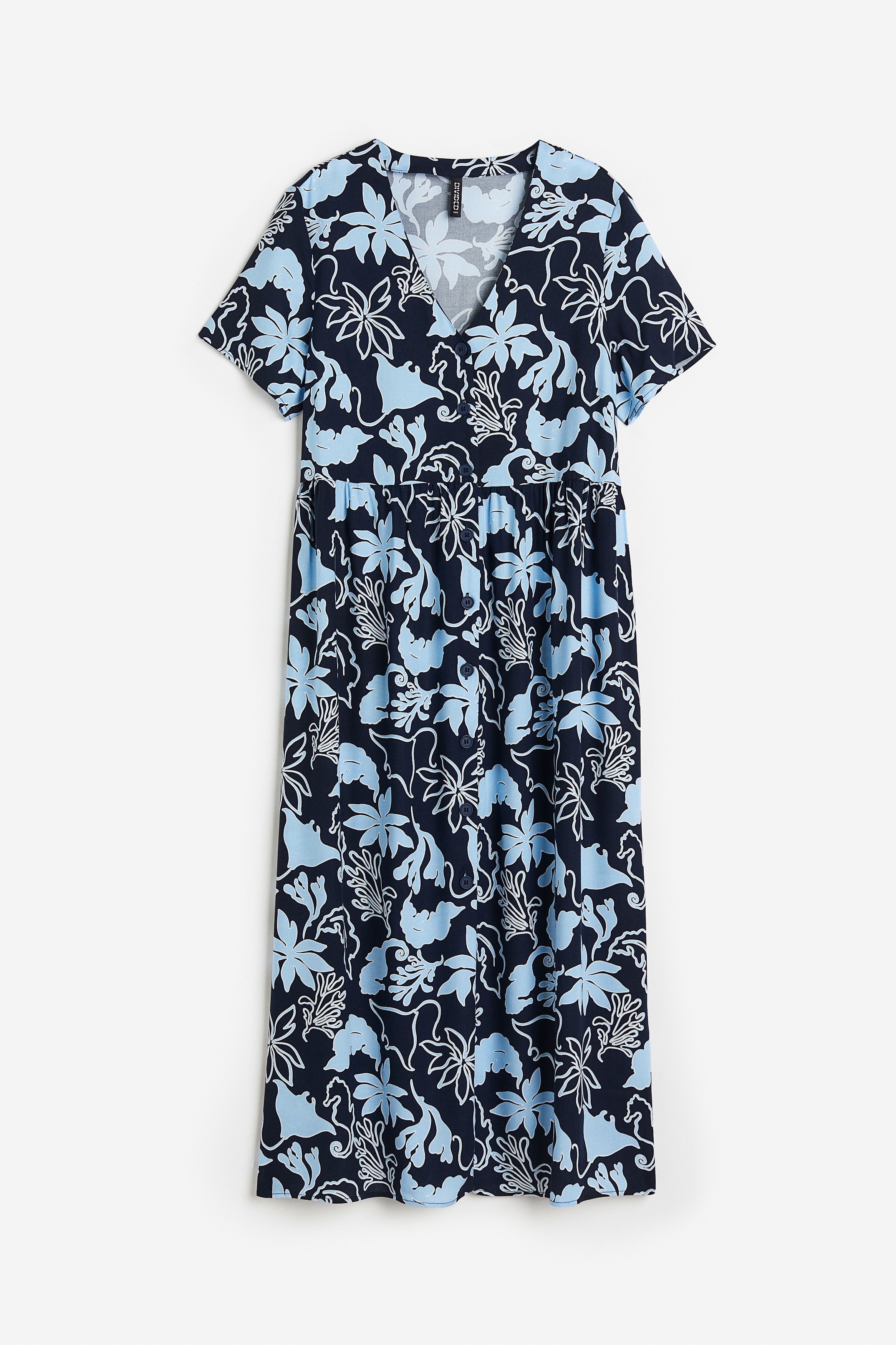 우븐 소재의 반소매 미디 원피스. 루즈핏. V넥. 앞면 버튼. 주름이 잡힌 허리 솔기. 안감 생략. 이미지