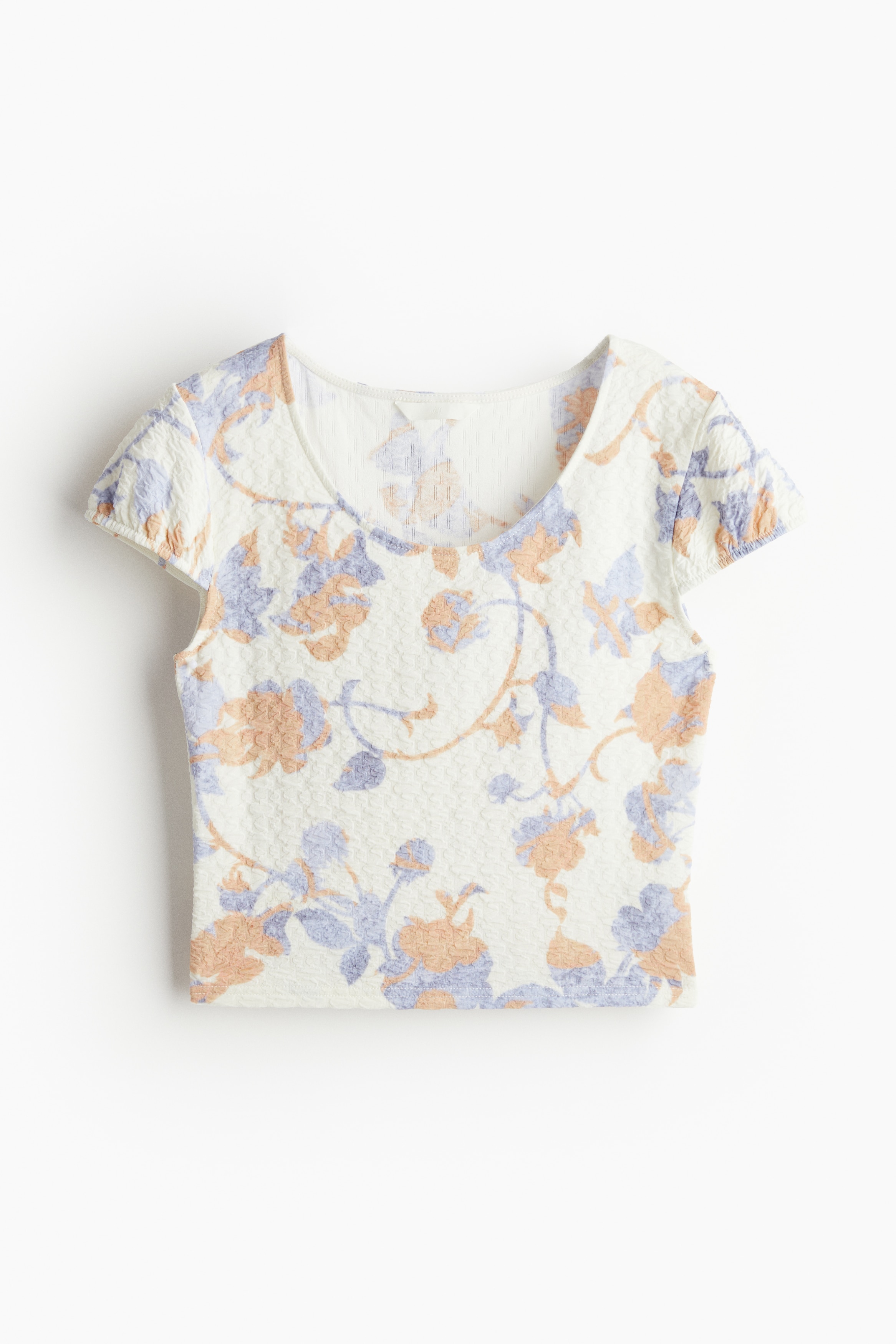 텍스처가 있는 저지 소재의 피트되는 크롭트 탑. 라운드넥, 캡소매. 이미지