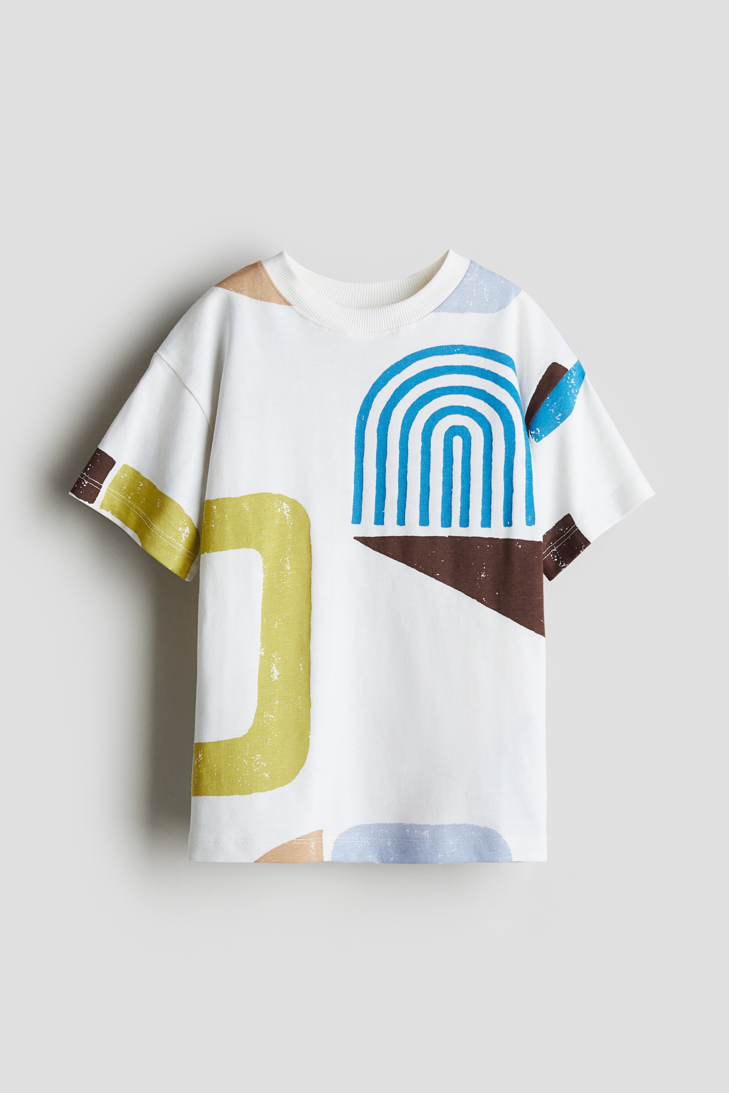 프린트가 있는 부드러운 코튼 저지 소재의 루즈핏 티셔츠. 리브드 마감 라운드 네크라인. 드롭 숄더. 이미지