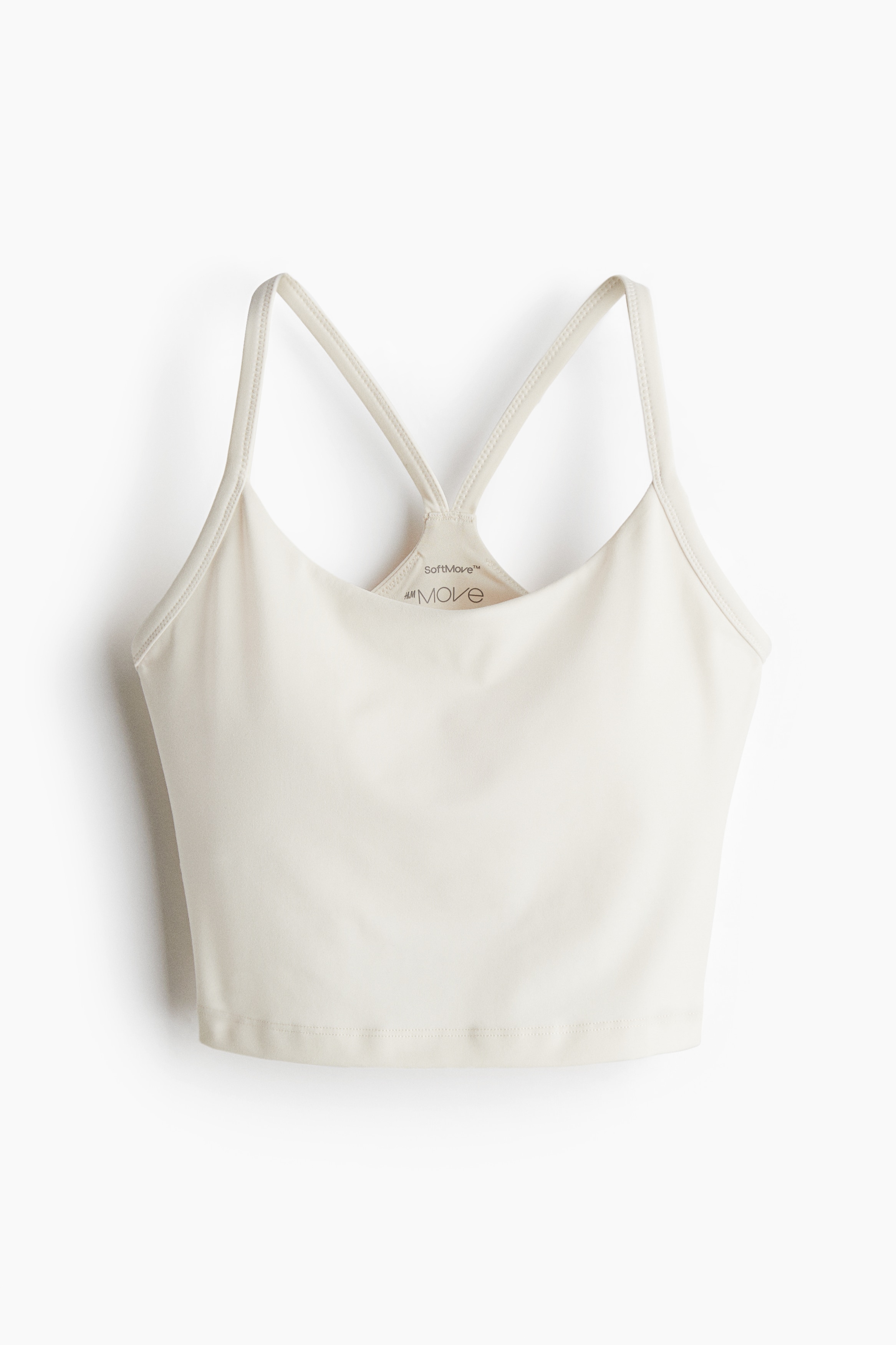 부드러움과 편안함의 극치를 선사하며 실루엣을 살려 서포트해주는 SoftMove™와 수분을 빠르게 흡수하는 DryMove™ 기술을 적용한 기능성 소재의 스포츠 브라. 앞면이 라운드넥으로 처리됨. 어깨 스트랩. 안감처리된 컵에 가슴 라인을 살려주는 탈부착식 캡이 내장되어 핏을 조절할 수 있음. 신축성 아랫단. 중간 강도 운동에 적합한 미디엄 서포트. 이미지
