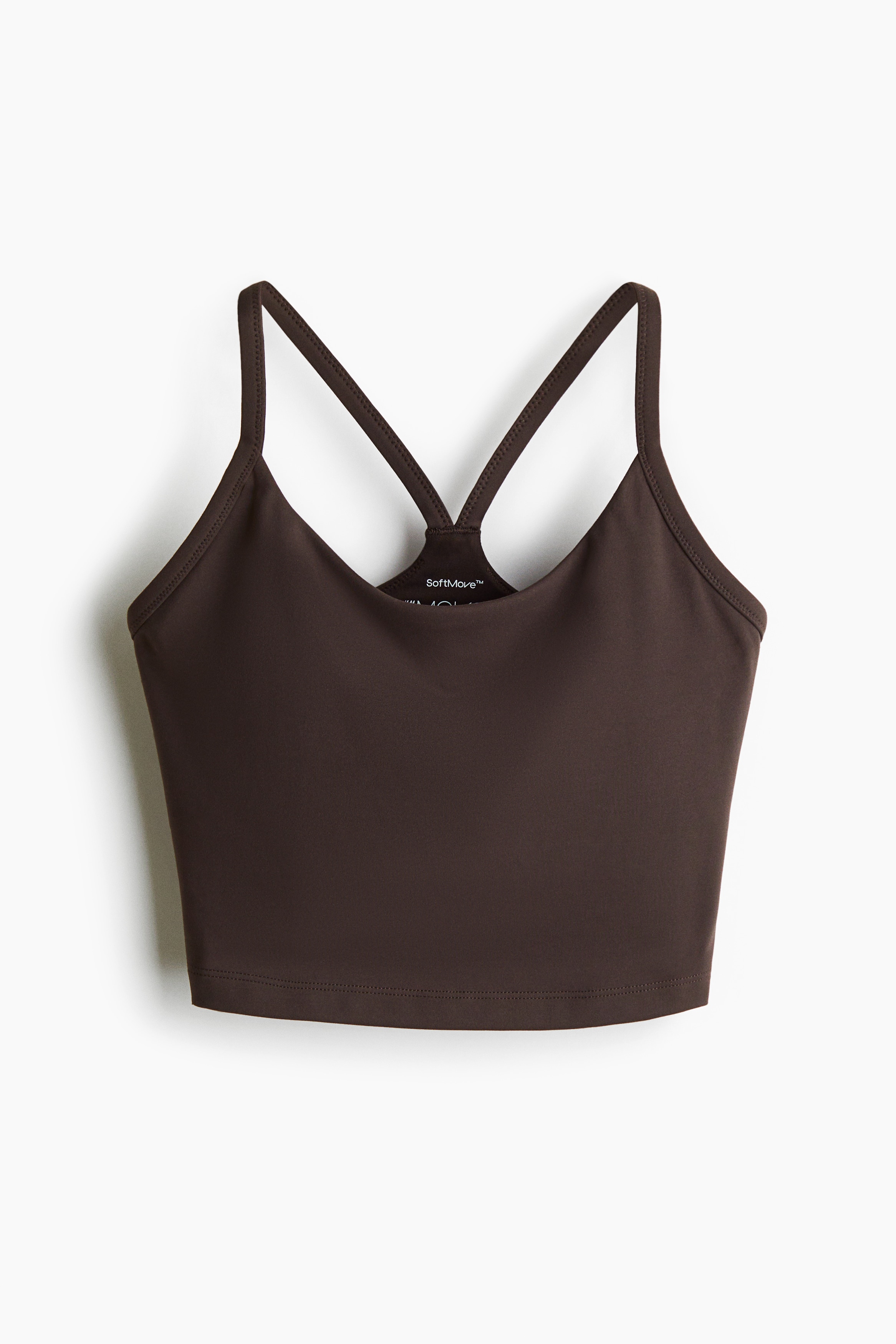 부드러움과 편안함의 극치를 선사하며 실루엣을 살려 서포트해주는 SoftMove™와 수분을 빠르게 흡수하는 DryMove™ 기술을 적용한 기능성 소재의 스포츠 브라. 앞면이 라운드넥으로 처리됨. 어깨 스트랩. 안감처리된 컵에 가슴 라인을 살려주는 탈부착식 캡이 내장되어 핏을 조절할 수 있음. 신축성 아랫단. 중간 강도 운동에 적합한 미디엄 서포트. 이미지