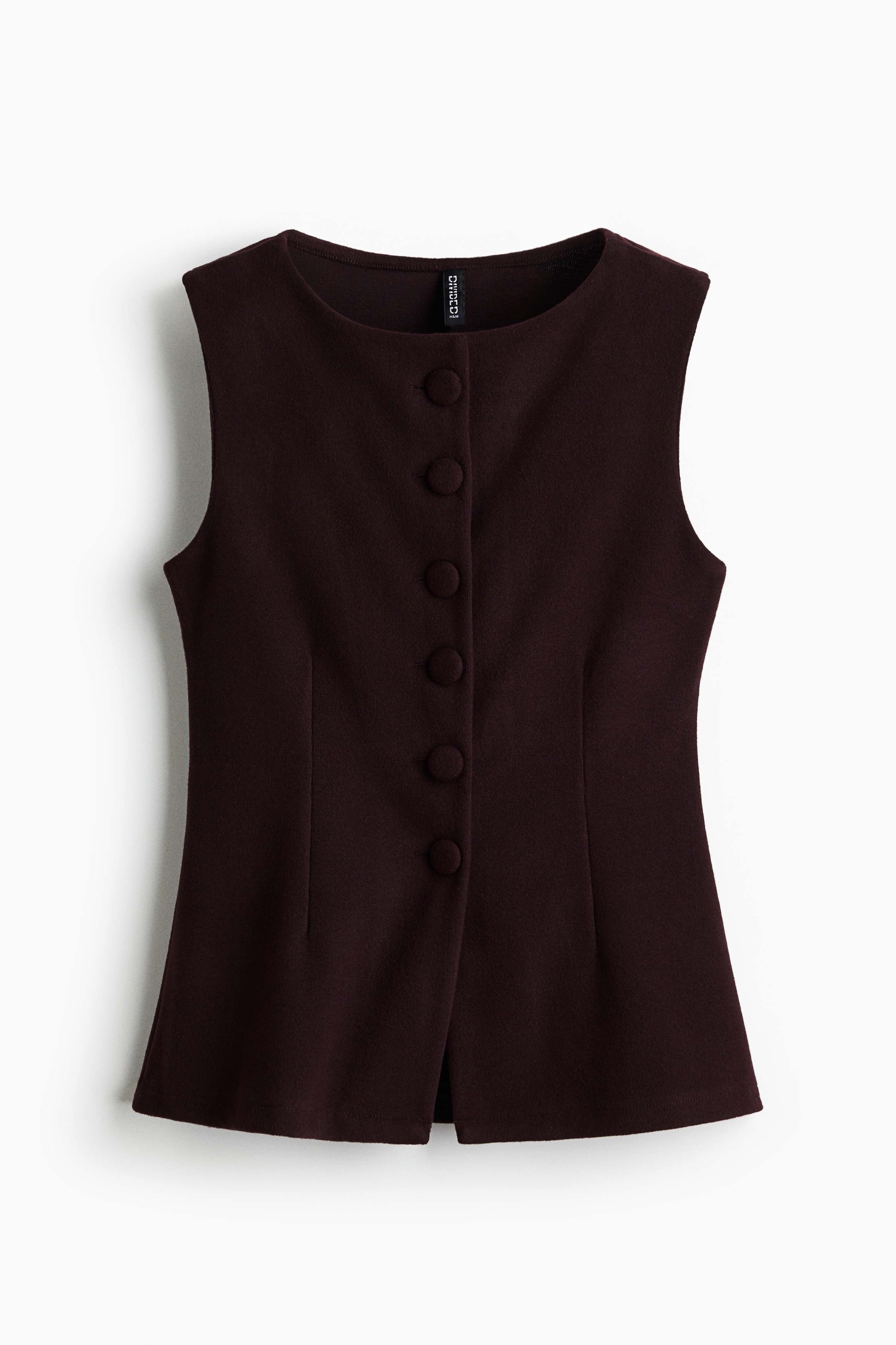 저지 소재의 피트되는 라운드넥 베스트. 앞면 커버드 버튼 클로징. 이미지