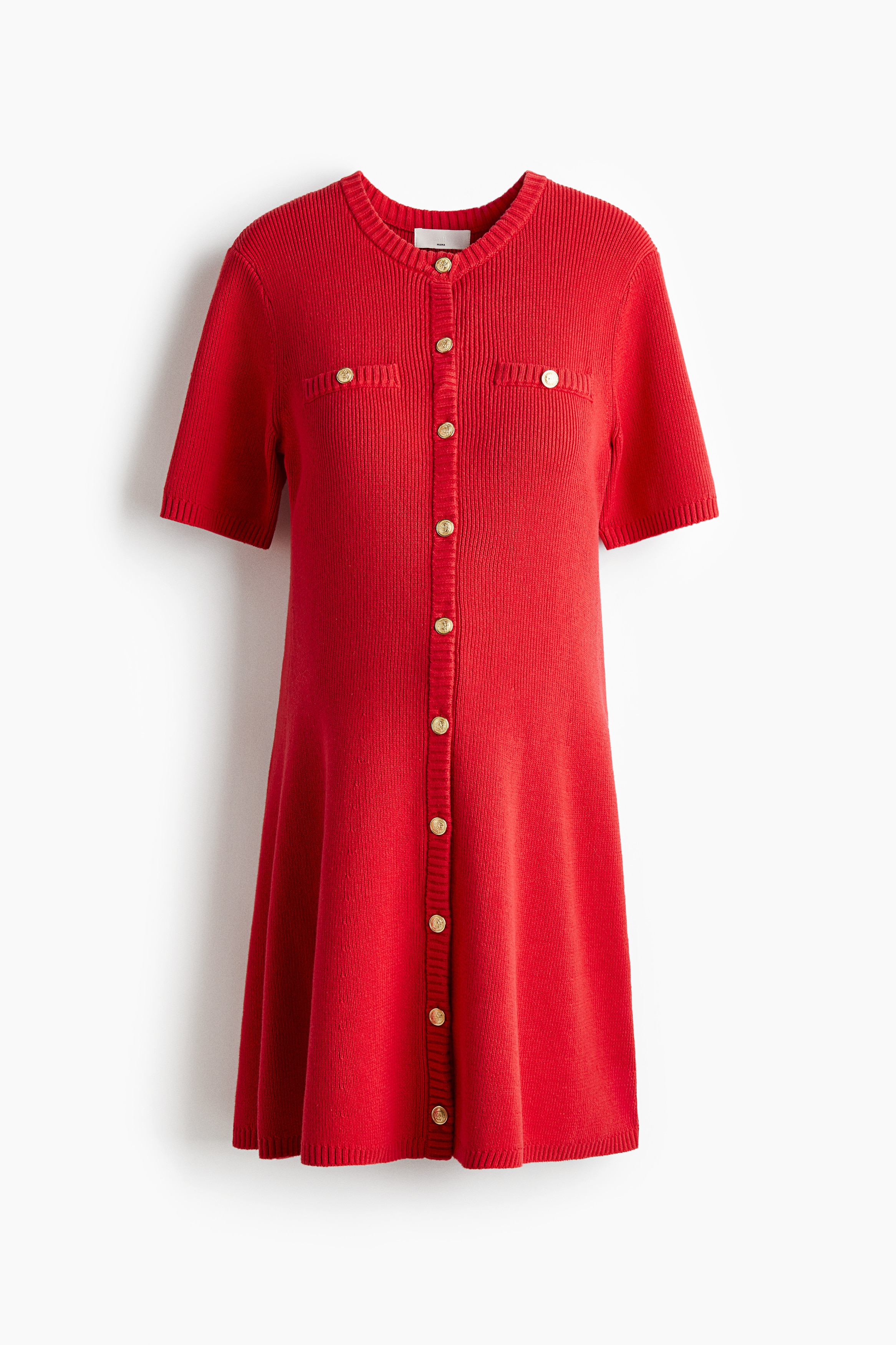 코튼이 혼방된 리브니트 소재의 미니 드레스. 라운드넥. 앞면 버튼. 가슴 페이크 포켓. 반소매. 세미 플레어 라인의 하단. 이미지