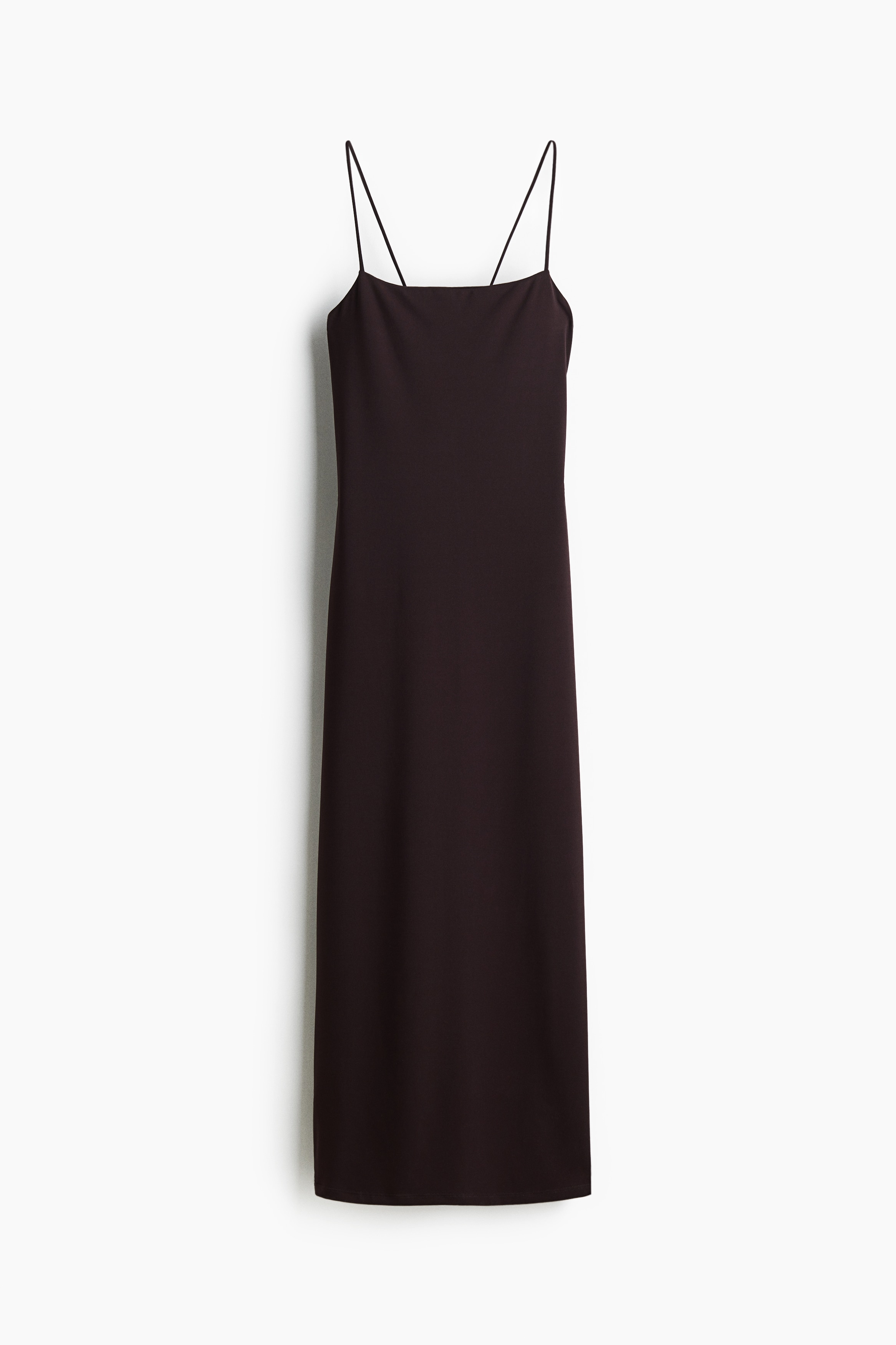 부드러운 저지 소재의 피트되는 라운드넥 미디 원피스. 네크라인과 등 부분이 깊게 파인 스타일. 가는 어깨 스트랩을 뒷면의 작은 고리에 꿰어 묶는 디자인. 이미지