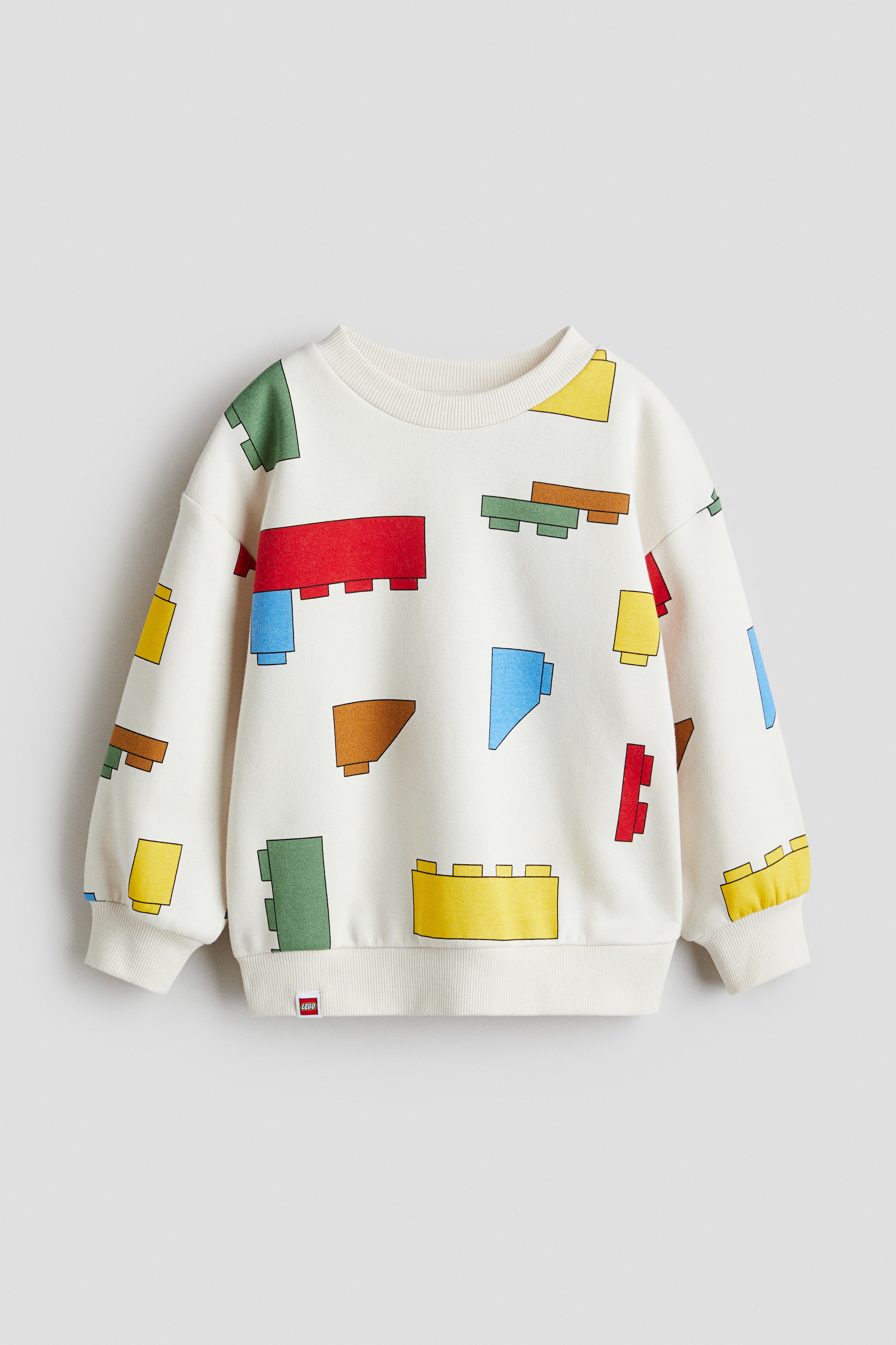 프린트가 있는 코튼 혼방 소재의 스웨트셔츠. 오버사이즈. 내부가 부드럽게 기모처리됨. 라운드넥. 드롭 숄더. 긴소매. 리브드 트리밍. 이미지