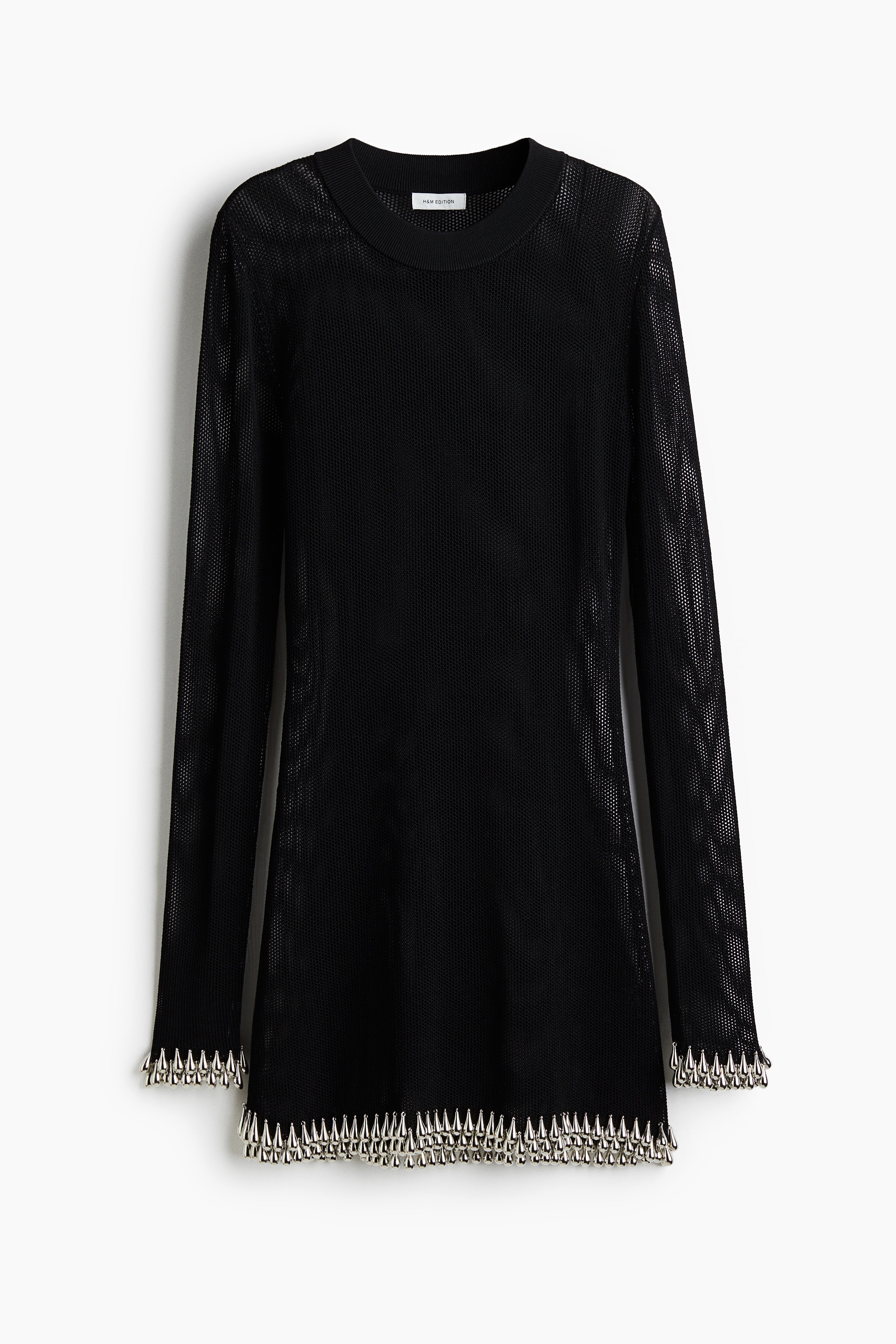 피트되는 롱 스타일의 그물 탑. 라운드넥. 긴소매. 물방울 모양의 비즈 2줄로 장식된 소맷단과 아랫단. 이미지