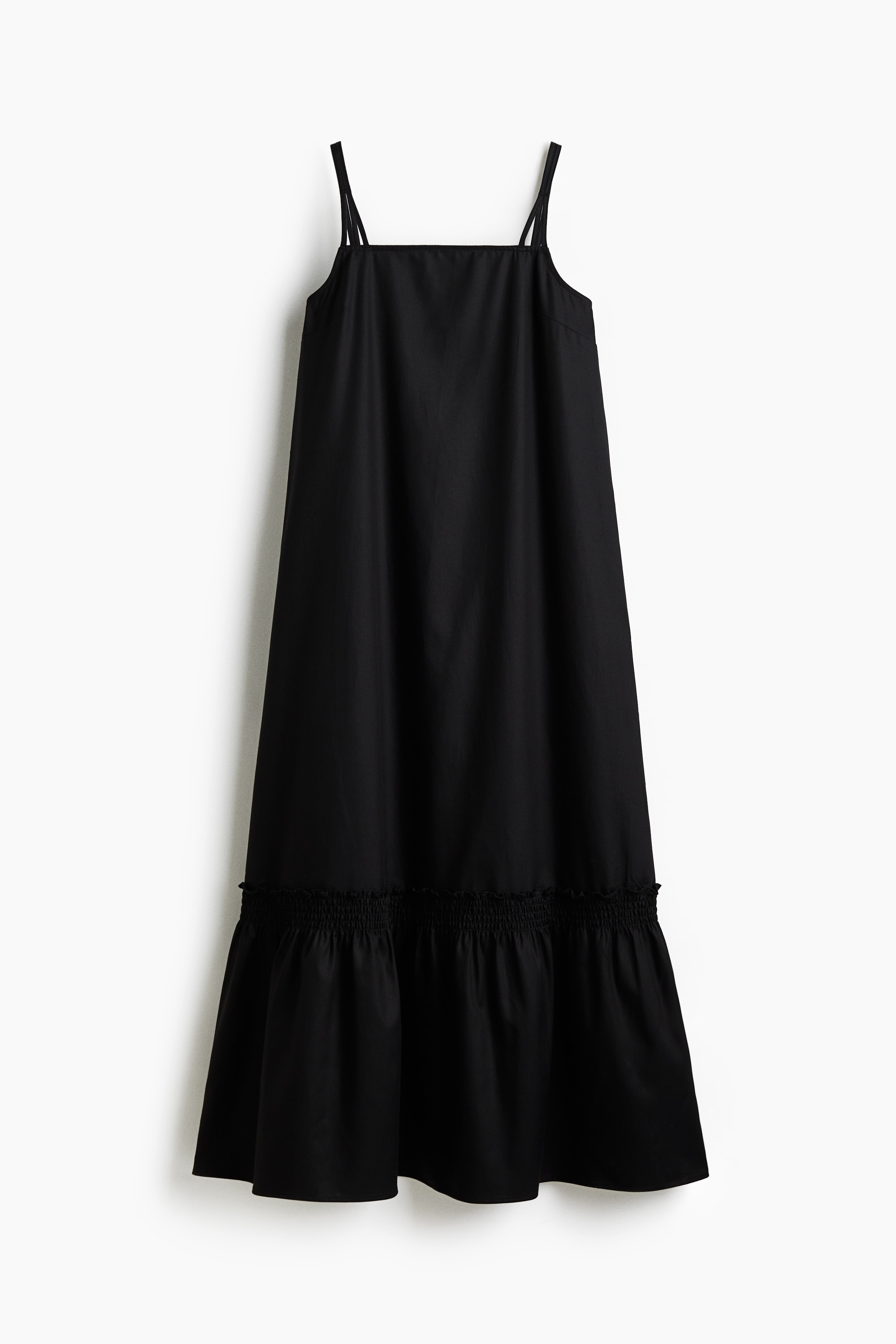 리오셀과 코튼이 혼방된 트윌 소재의 미디 드레스. 스트레이트 네크라인. 가는 더블 어깨 스트랩. 하단의 스모킹 주름 디테일로 풍성함을 더한 실루엣. 안감 생략. 이미지