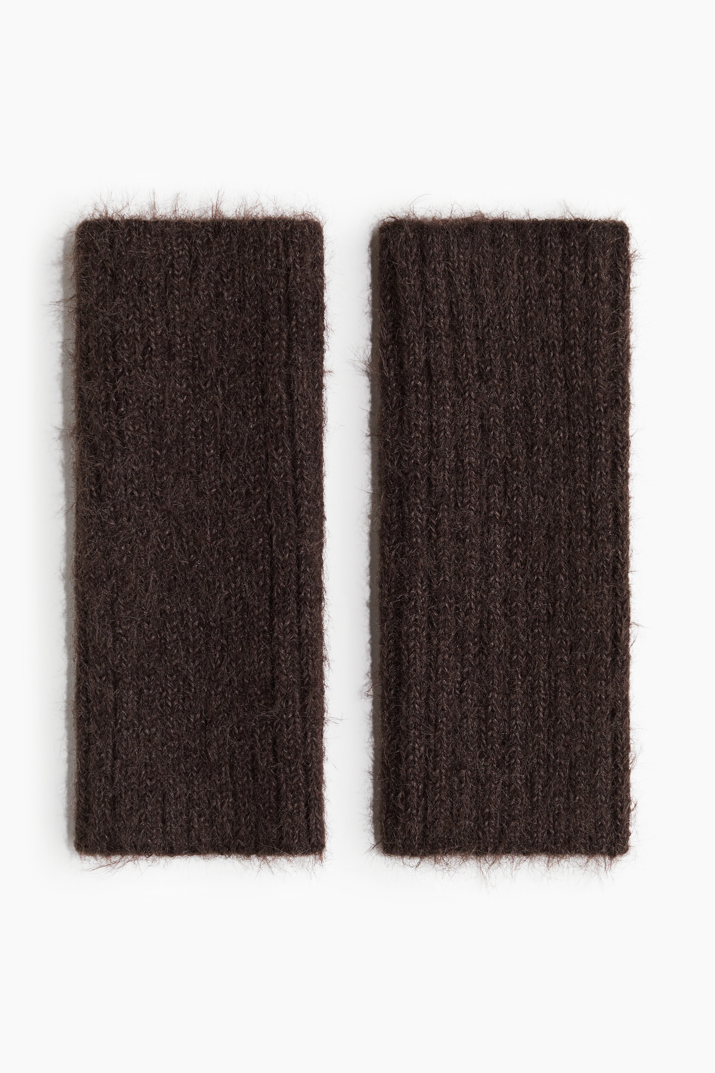 기모처리된 부드러운 리브니트 소재의 손목 워머. 엄지손가락 구멍이 있음. 이미지