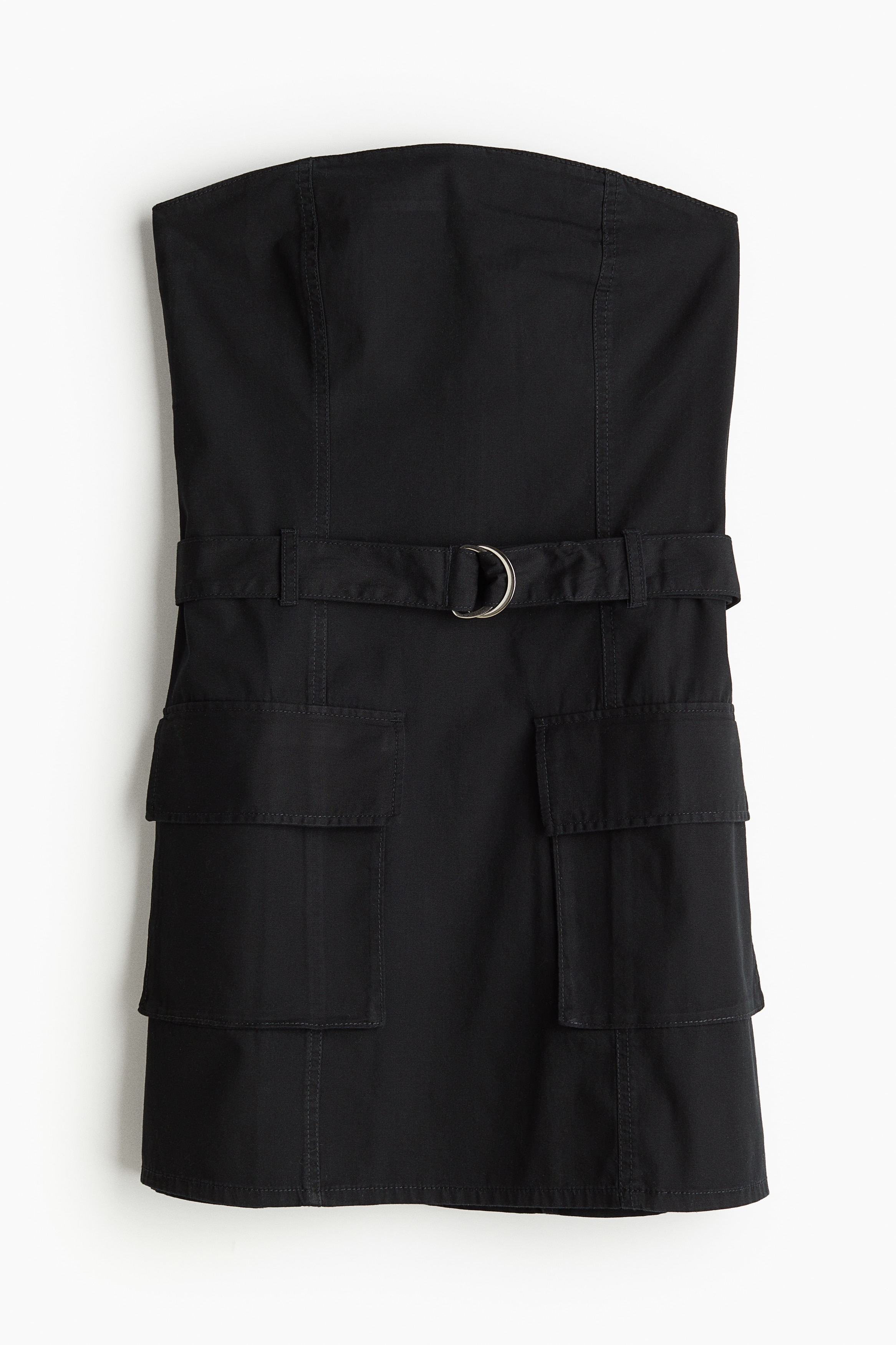 코튼 캔버스 소재의 짧고 피트되는 슬리브리스 원피스. 신축성 있게 마감된 상단. 뒷면 히든 지퍼와 후크 클로저. 핏 조절 가능한 탈부착식 벨트를 두른 디자인. 플랩이 있는 앞면 벨로즈 포켓. 안감 생략. 이미지