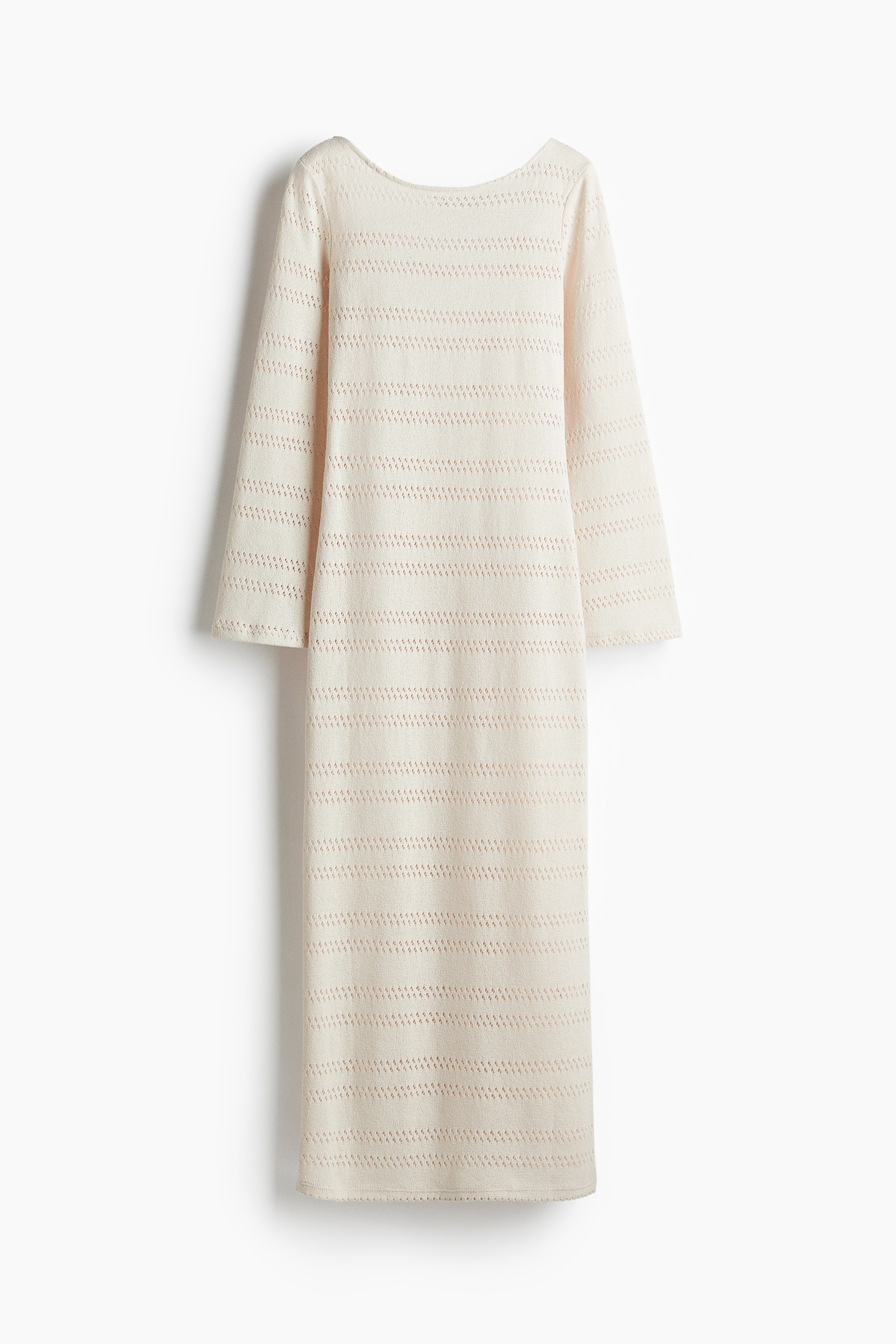 부드러운 홀 니트 소재의 피트되는 롱 원피스. 섬세한 보트넥. 레이스업 장식의 로백 디자인. 와이드한 긴소매. 스트레이트 헴라인. 안감 생략. 이미지