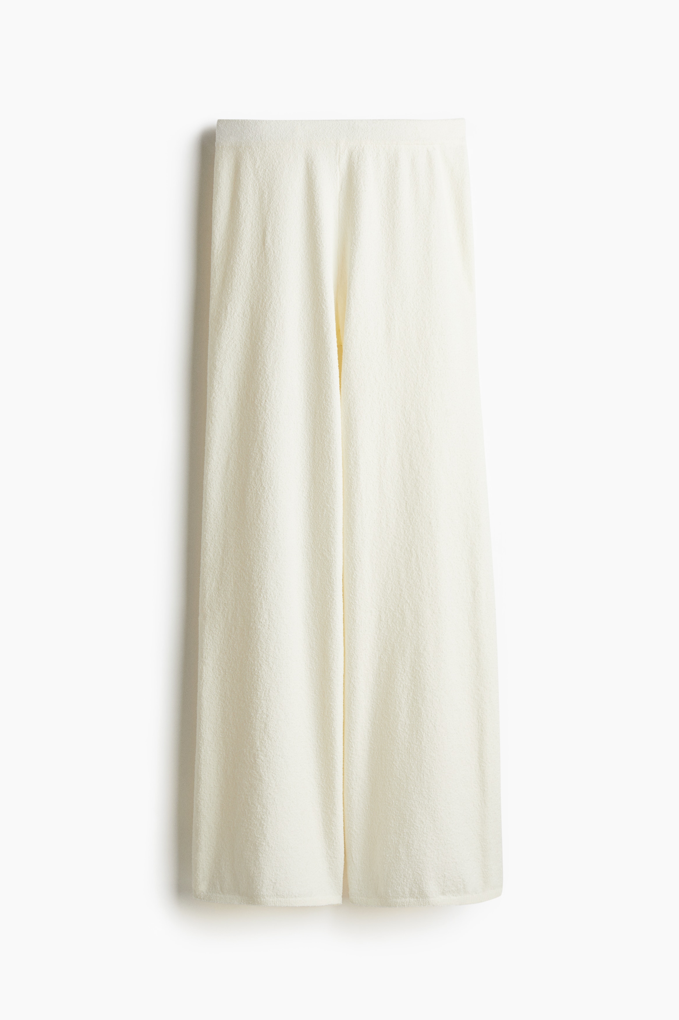 부드러운 부클레 니트 소재의 팬츠. 허릿단 히든 밴딩. 스트레이트 레그. 이미지