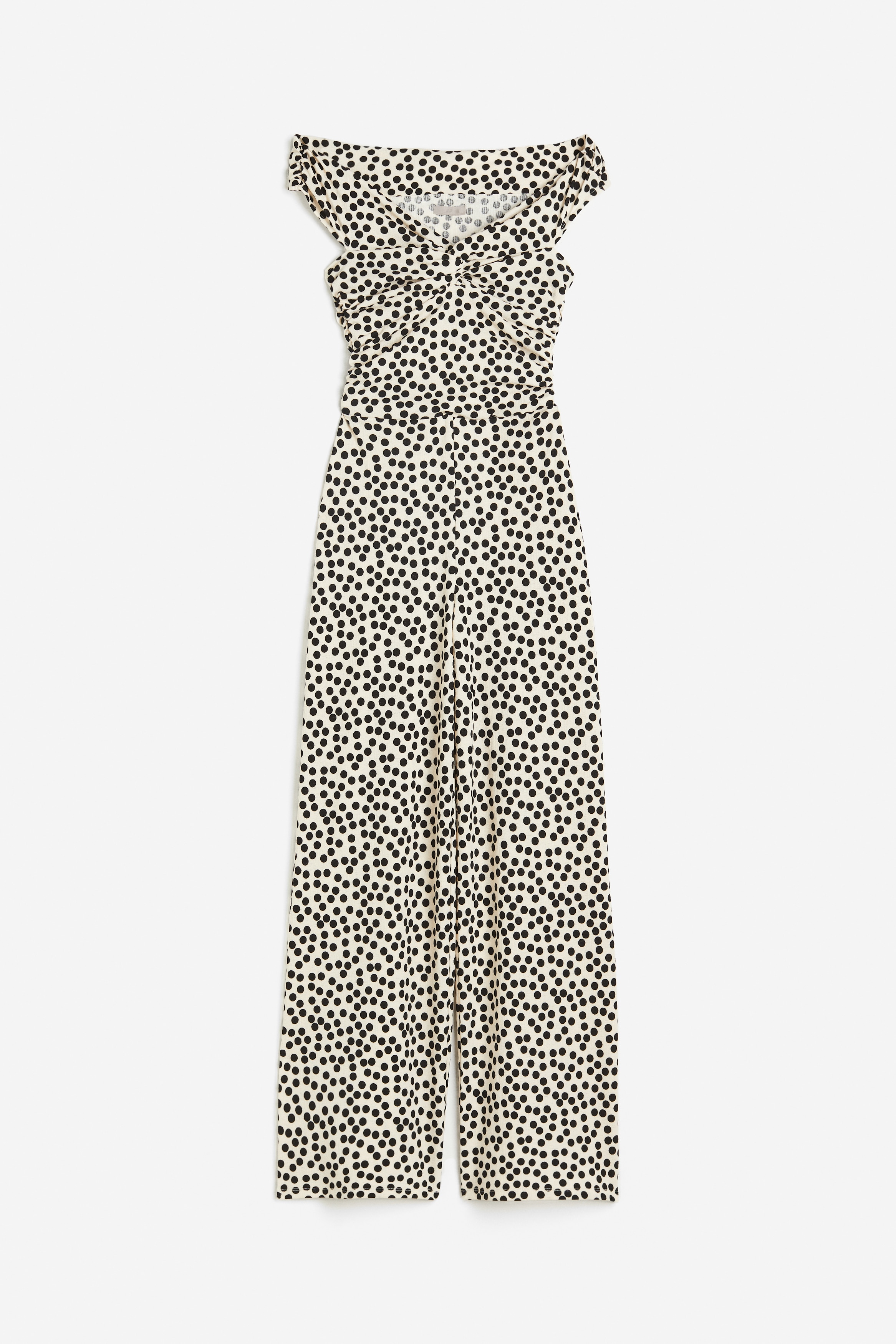 텍스처가 있는 저지 소재의 오프숄더 점프수트. 피트되는 보디스. 가슴 중앙 트위스트 디테일. 옆면 솔기에 주름을 잡아 가볍게 드레이핑 효과를 준 디자인. 한쪽 옆면 히든 지퍼 클로저. 와이드한 스트레이트 레그. 상단 안감 부착. 이미지