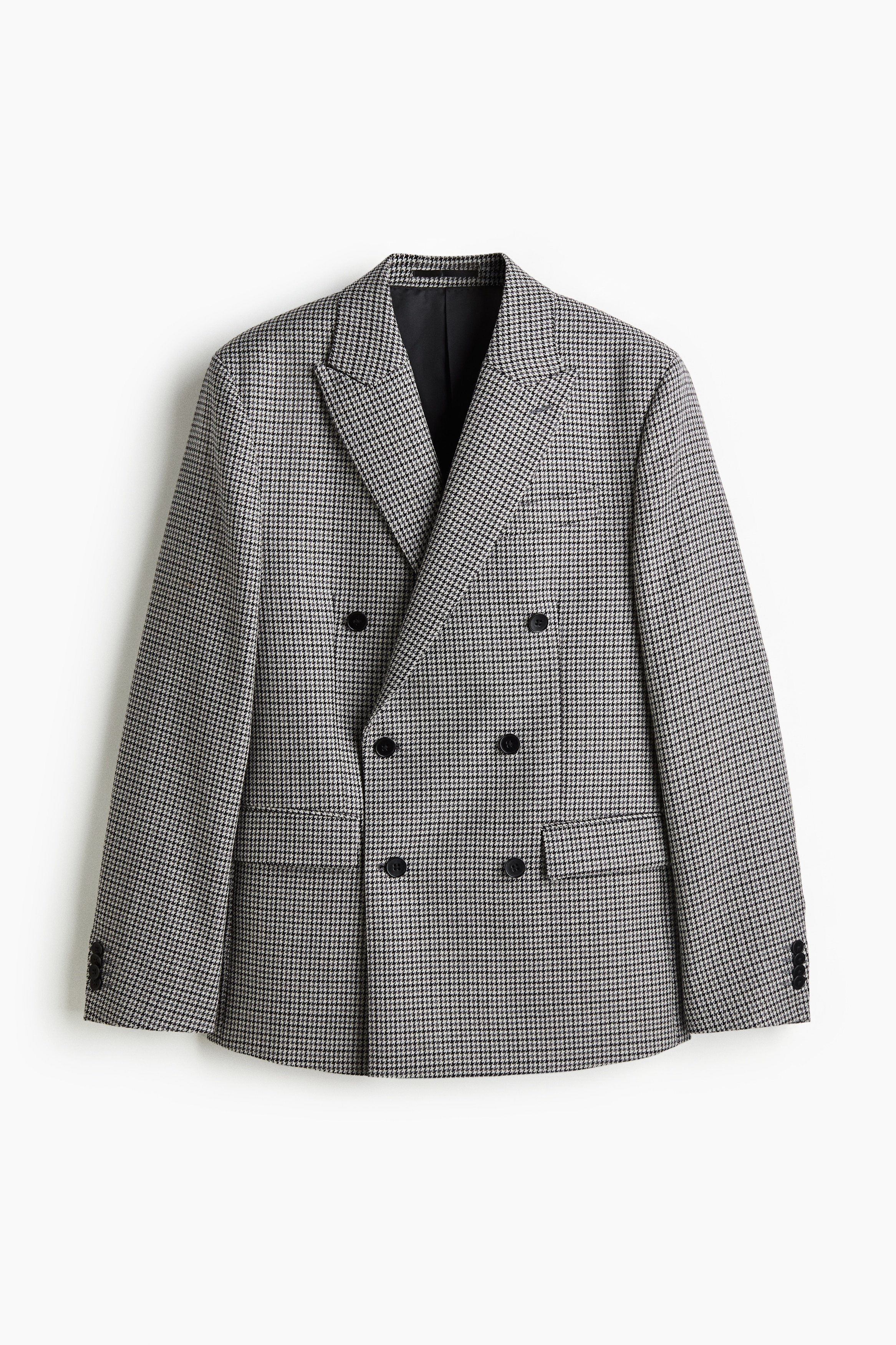 이탈리아 원단 제조업체 Cangioli에서 공급받은 부드러운 울 소재의 더블 브레스티드 재킷. 피크트 라펠. 가슴 웰트포켓. 플랩이 있는 앞면 웰트포켓. 내부 포켓 3개. 소맷단 버튼 장식. 뒷트임 2개. 착용감이 편안하고 클래식한 레귤러핏 실루엣. 안감 부착. 이미지