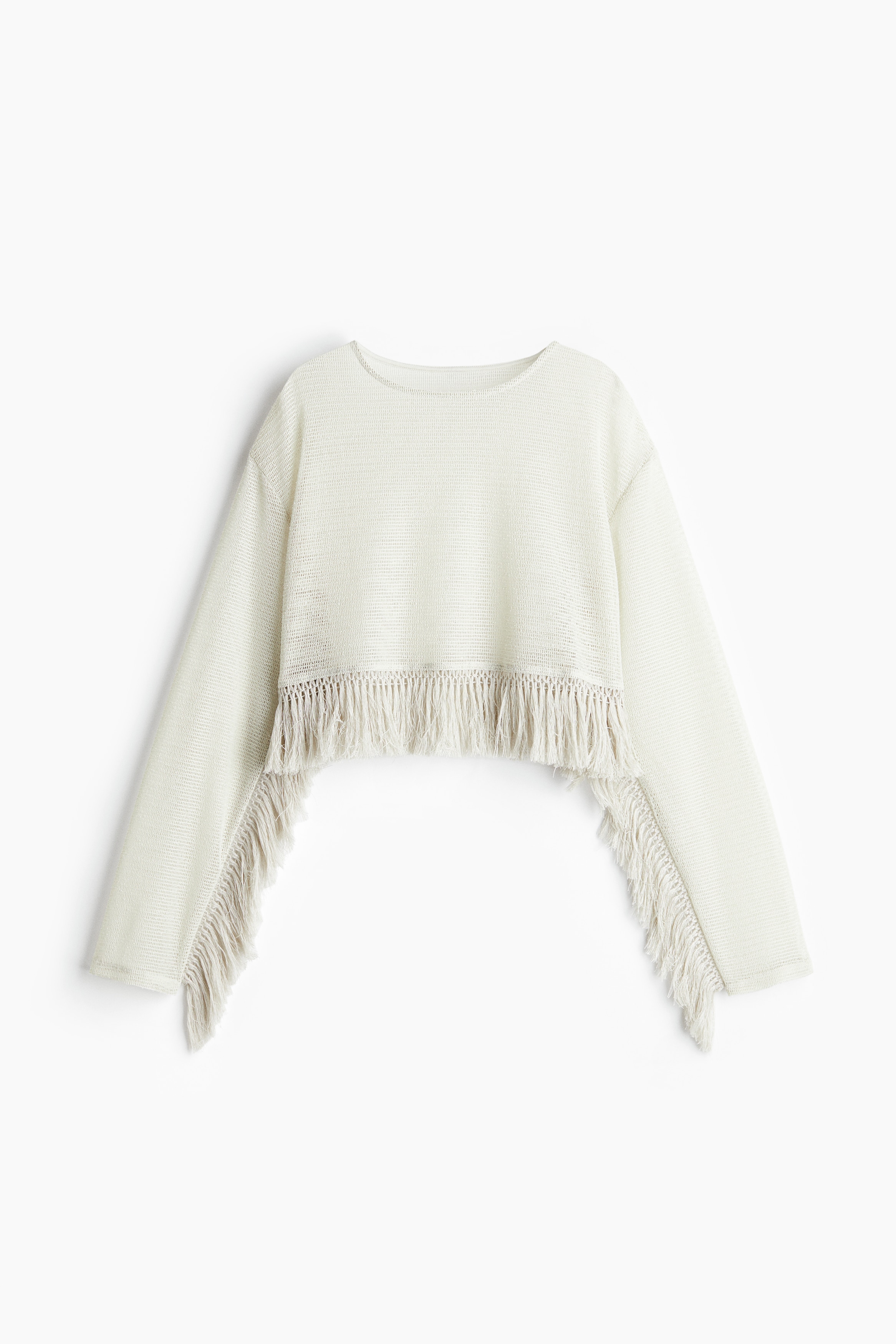 홀 파인니트 소재의 긴소매 크롭트 탑. 루즈핏. 라운드넥. 드롭 숄더. 프린지로 장식된 소매와 아랫단. 이미지1