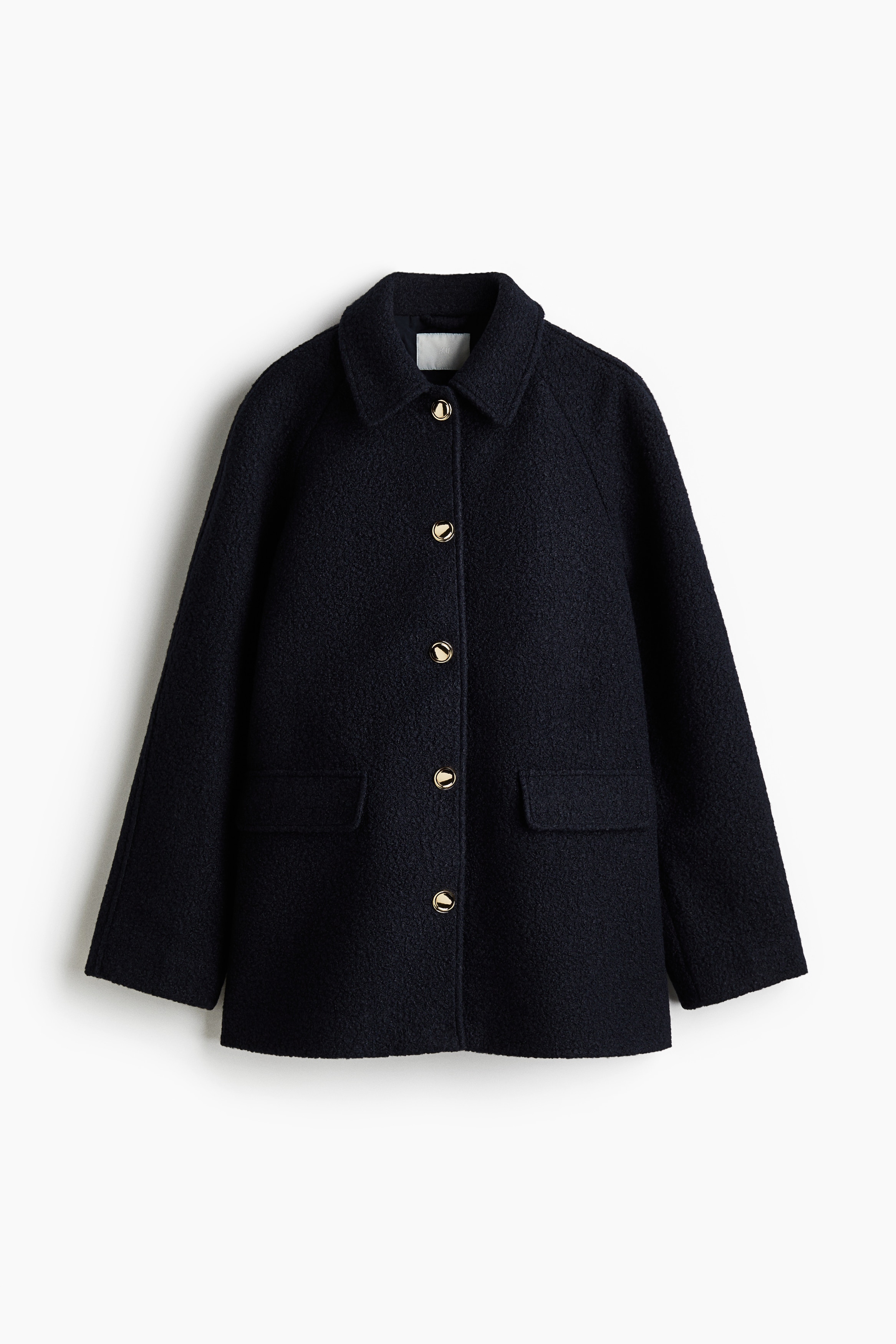 A-line coat in a felted weave with a collar and buttons down the front. Long raglan sleeves and flap front pockets. Lined. 이미지