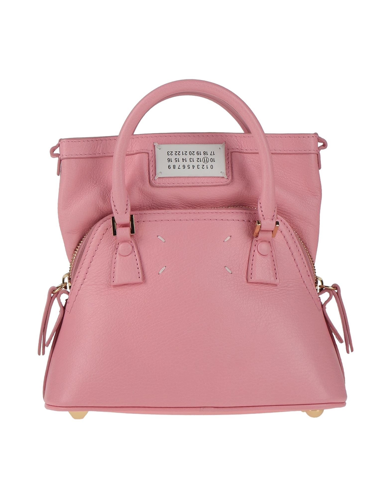 미디엄 스타일, 텍스쳐드 가죽, 브랜드 로고, 솔리드 컬러, 지퍼 여밈, 스냅버튼 여밈, 안감있음, 내부 포켓, 더블 핸들, 탈착가능 숄더 스트랩, 메탈 스트랩, 스터드 장식 바닥, 동물성 비섬유 자재 함유, 사첼백. 이미지