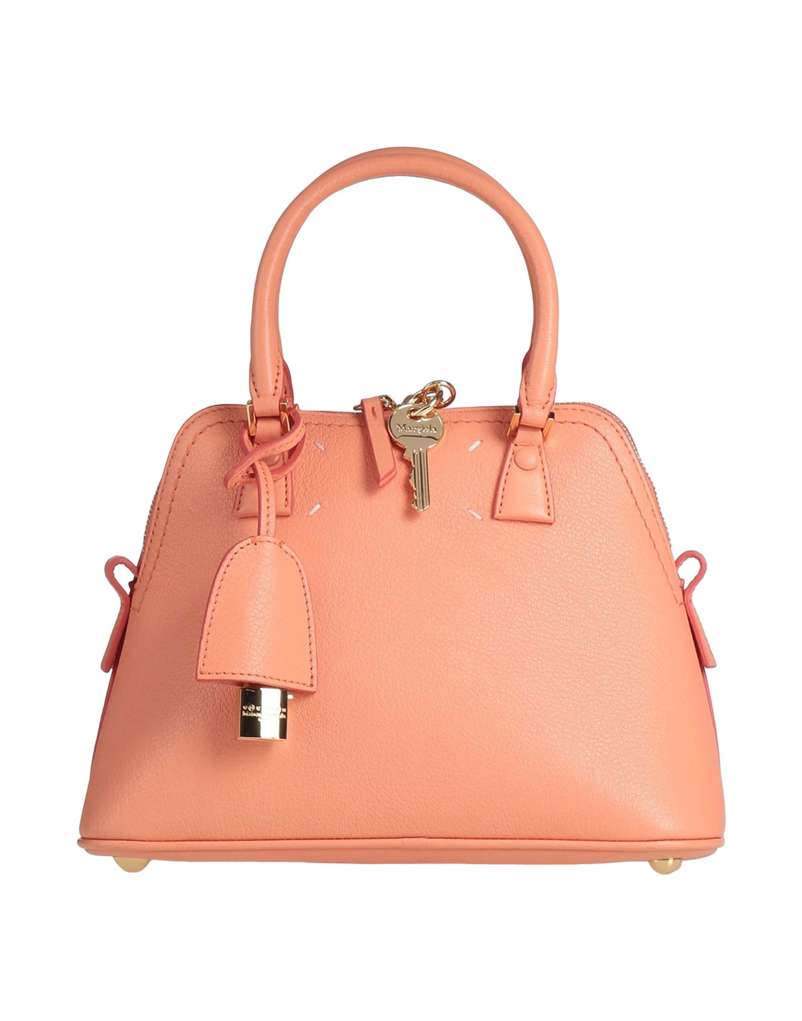 사첼백, 페블 효과 가죽, 솔리드 컬러, 브랜드 로고, 지퍼 여밈, 내부 지퍼 포켓, 더블 핸들, 탈착가능 숄더 스트랩, 가죽 스트랩, 스터드 장식 바닥장식 바닥2, 미디엄 스타일, 동물성 비섬유 자재 함유. 이미지