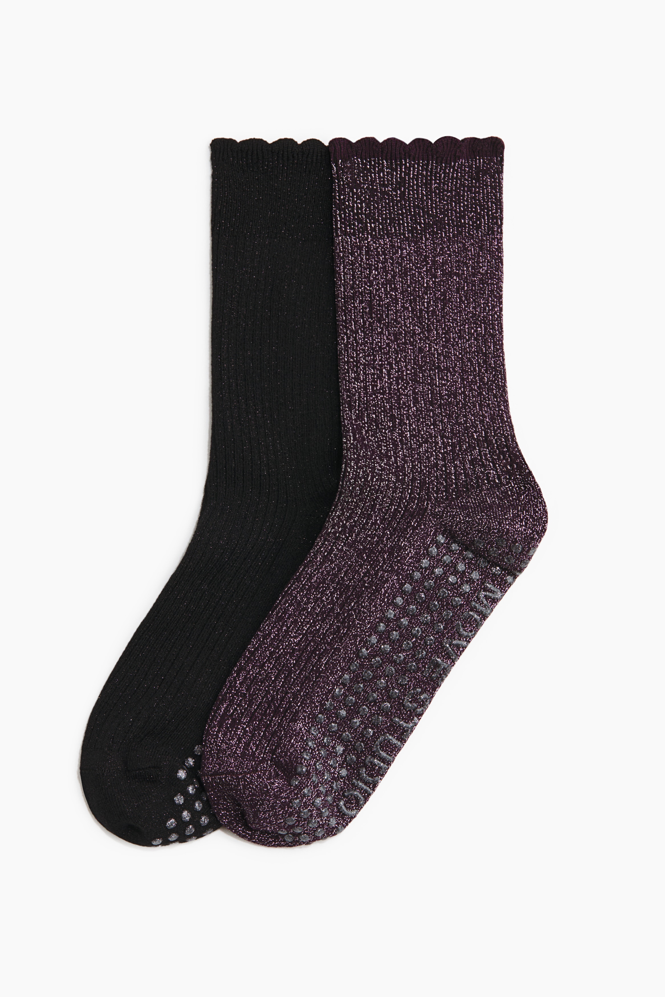 Socks in a glittery, rib-knit fabric featuring high ribbed shafts with a scalloped top edge and terry soles with anti-slip protectors for extra grip on your yoga or Pilates mat. 이미지