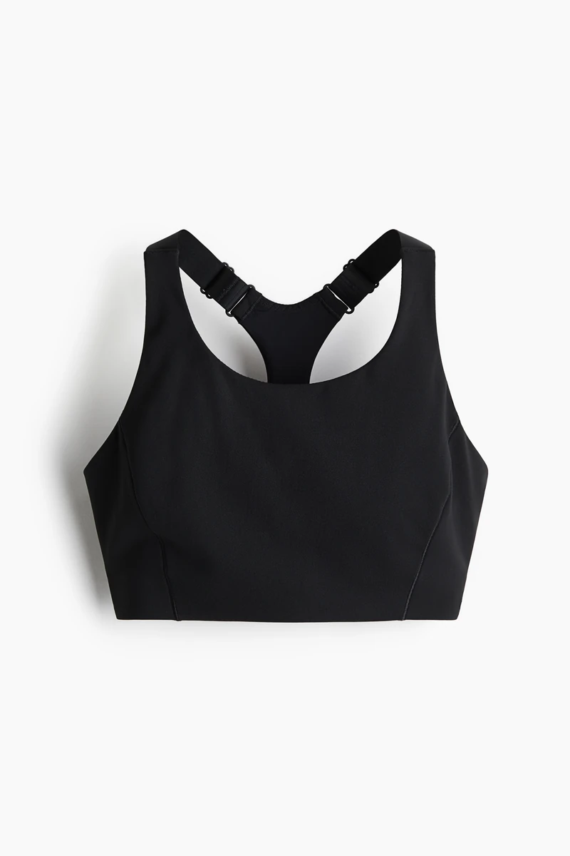 활동 중에도 몸을 탄탄하게 서포트해주는 타이트한 핏감의 ShapeMove™와 수분을 빠르게 흡수하는 DryMove™ 기술을 적용한 기능성 소재의 스포츠 브라. 안감처리된 컵에 가슴 라인을 살려주는 탈부착식 캡이 내장되어 핏을 조절할 수 있음. 길이 조절 가능한 와이드한 어깨 스트랩. 메쉬로 마감된 레이서백 디자인의 뒷면에 컷아웃 디테일이 있음. 뒷면 후크 클로저. 고강도 운동에 적합한 하이 서포트. 이미지1