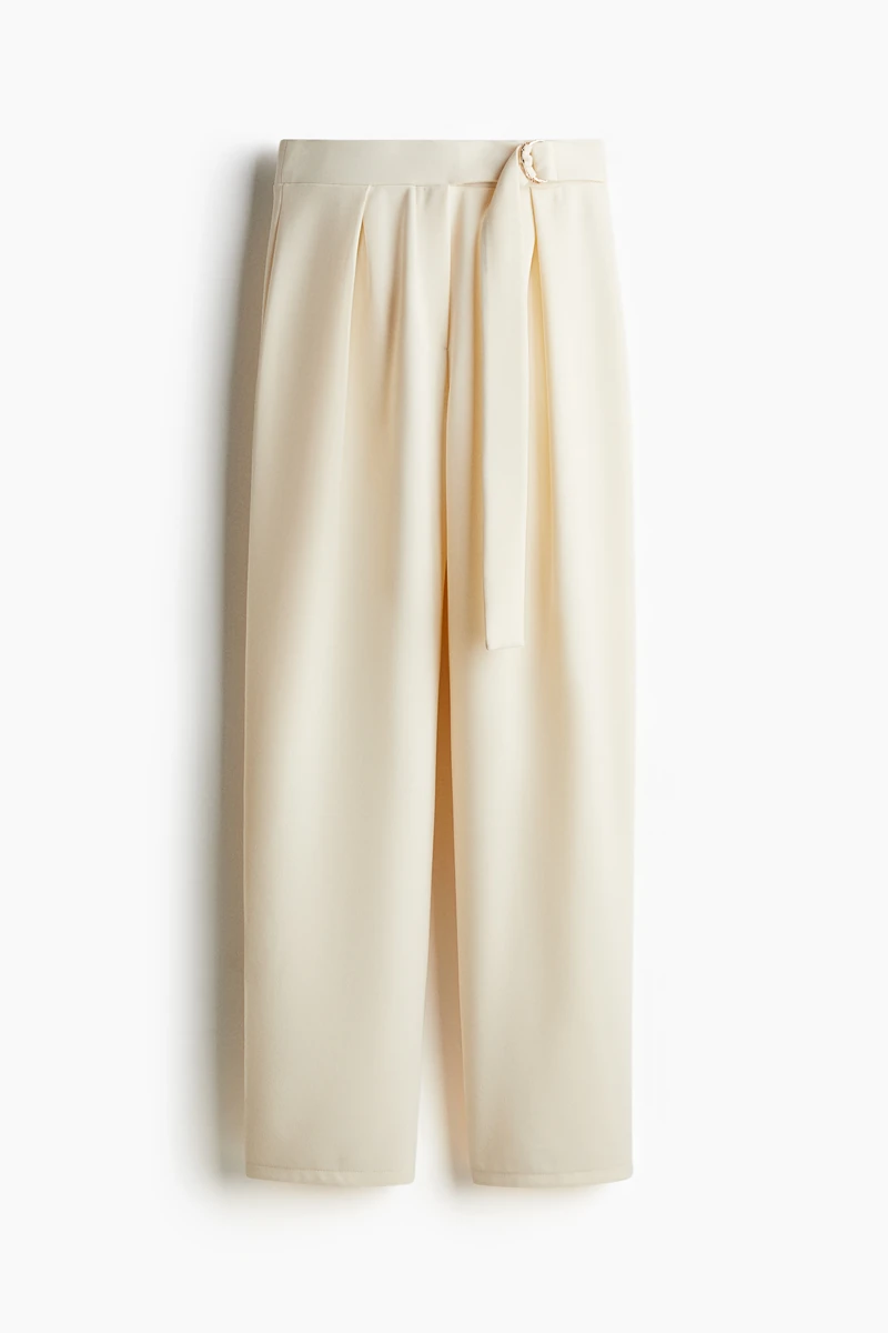 Tailored trousers in jersey featuring a high waist with concealed elastication, a fake fly and a sewn-in belt with metal D-rings at one side. Tapered legs with pleats at the front for a flattering silhouette. 이미지1