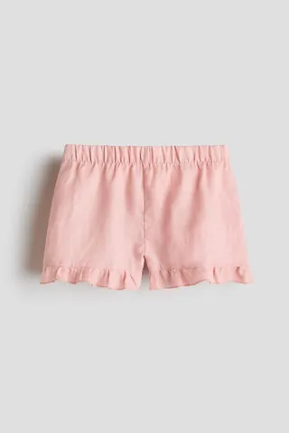 따뜻한 여름 시즌에 알맞은 부드럽고 가벼운 리넨 소재의 반바지. 밴딩으로 허리 사이즈 조절. 섬세한 프릴로 장식된 아랫단. 리넨은 시간이 지날수록 부드러워지는 가벼운 질감과 빠른 건조 특성을 지닌 유행을 타지 않는 섬유입니다. H & M Adorables 컬렉션은 시대를 초월한 매력을 지닌 매우 편안하고 고급스러운 제품들로 엄선된 컬렉션입니다. 이미지