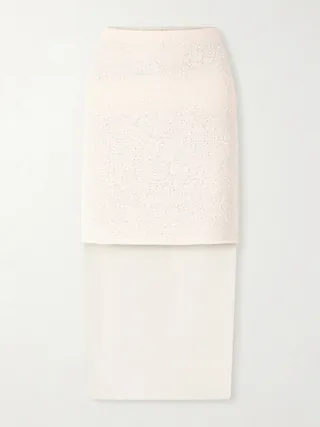 NET-A-PORTER 단독 상품입니다. KHAITE의 2026년 봄 컬렉션은 예술적으로 해체된 느낌을 줍니다. 코튼 블렌드 부클레 소재로 컬럼 실루엣을 살려 테일러링된 '시빌' 스커트는 반투명한 오간자 소재를 레이어드하여 아름다운 대비를 선사합니다. 매칭되는 캐미솔과 함께 스타일링해 보세요. 이미지