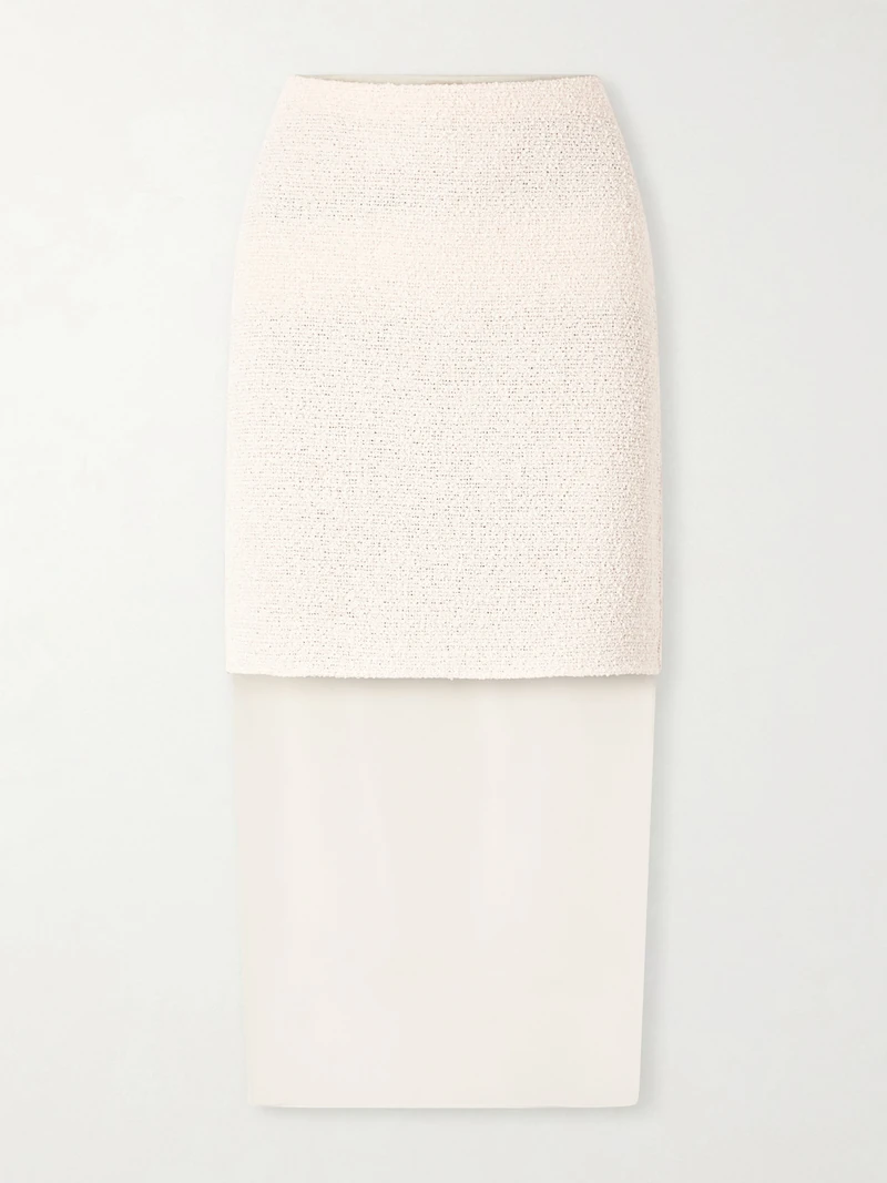 NET-A-PORTER 단독 상품입니다. KHAITE의 2026년 봄 컬렉션은 예술적으로 해체된 느낌을 줍니다. 코튼 블렌드 부클레 소재로 컬럼 실루엣을 살려 테일러링된 '시빌' 스커트는 반투명한 오간자 소재를 레이어드하여 아름다운 대비를 선사합니다. 매칭되는 캐미솔과 함께 스타일링해 보세요. 이미지1